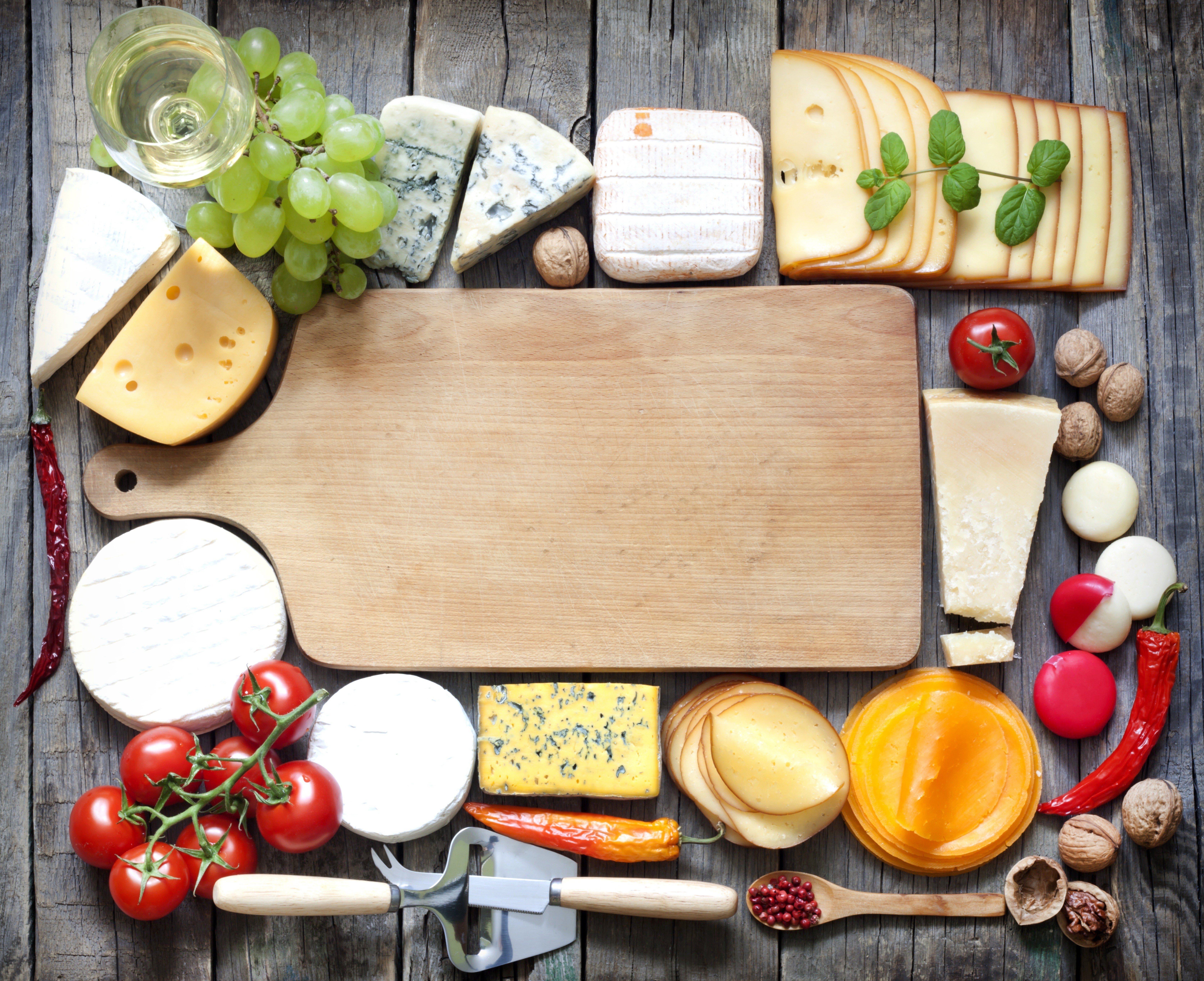 Cheese, Grapes, Tomatoes, Nuts, and Peppers on Wooden Table HD Wallpaper