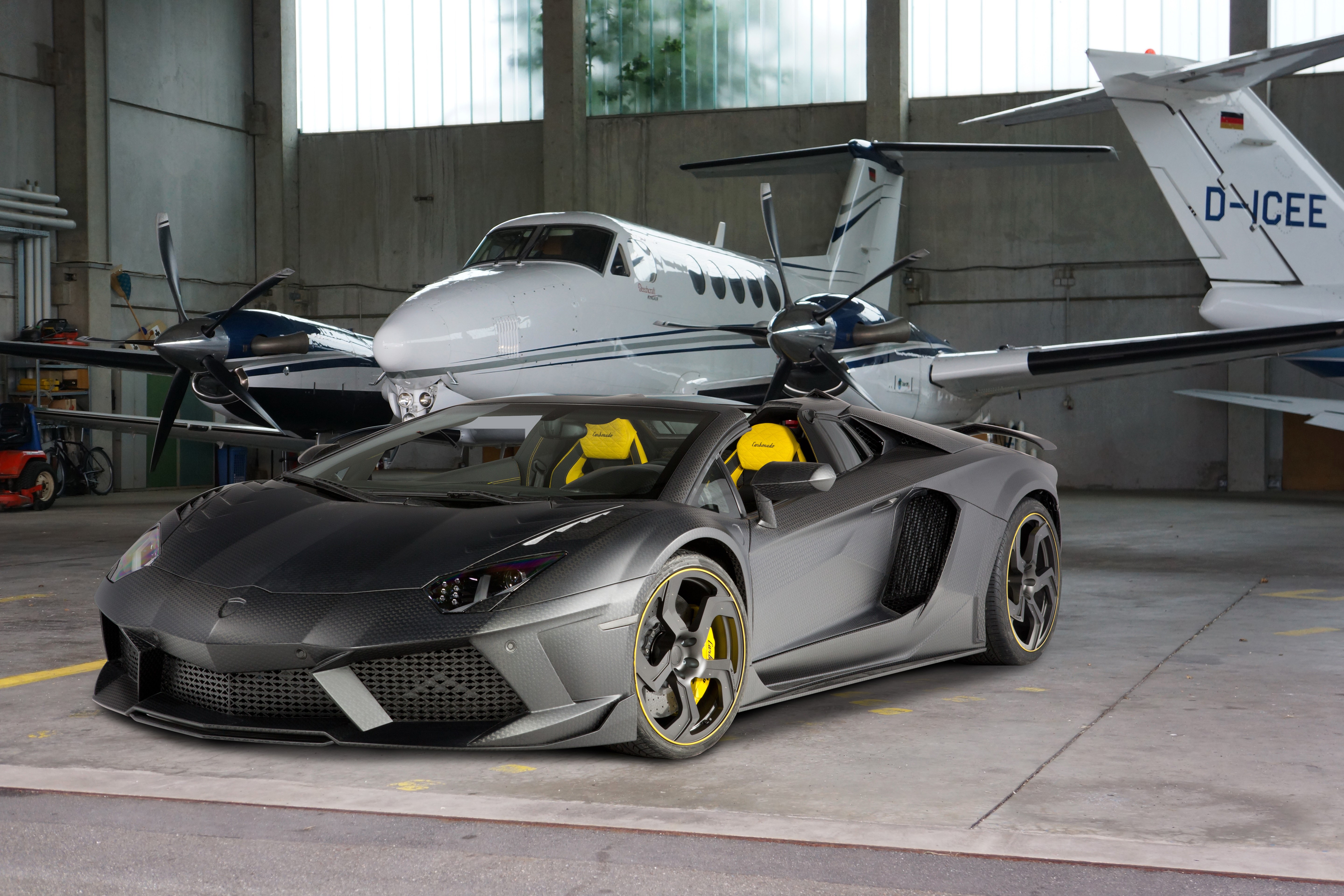 4K 2014 Mansory Carbonado Apertos Lamborghini Aventador in Hangar HD Wallpaper