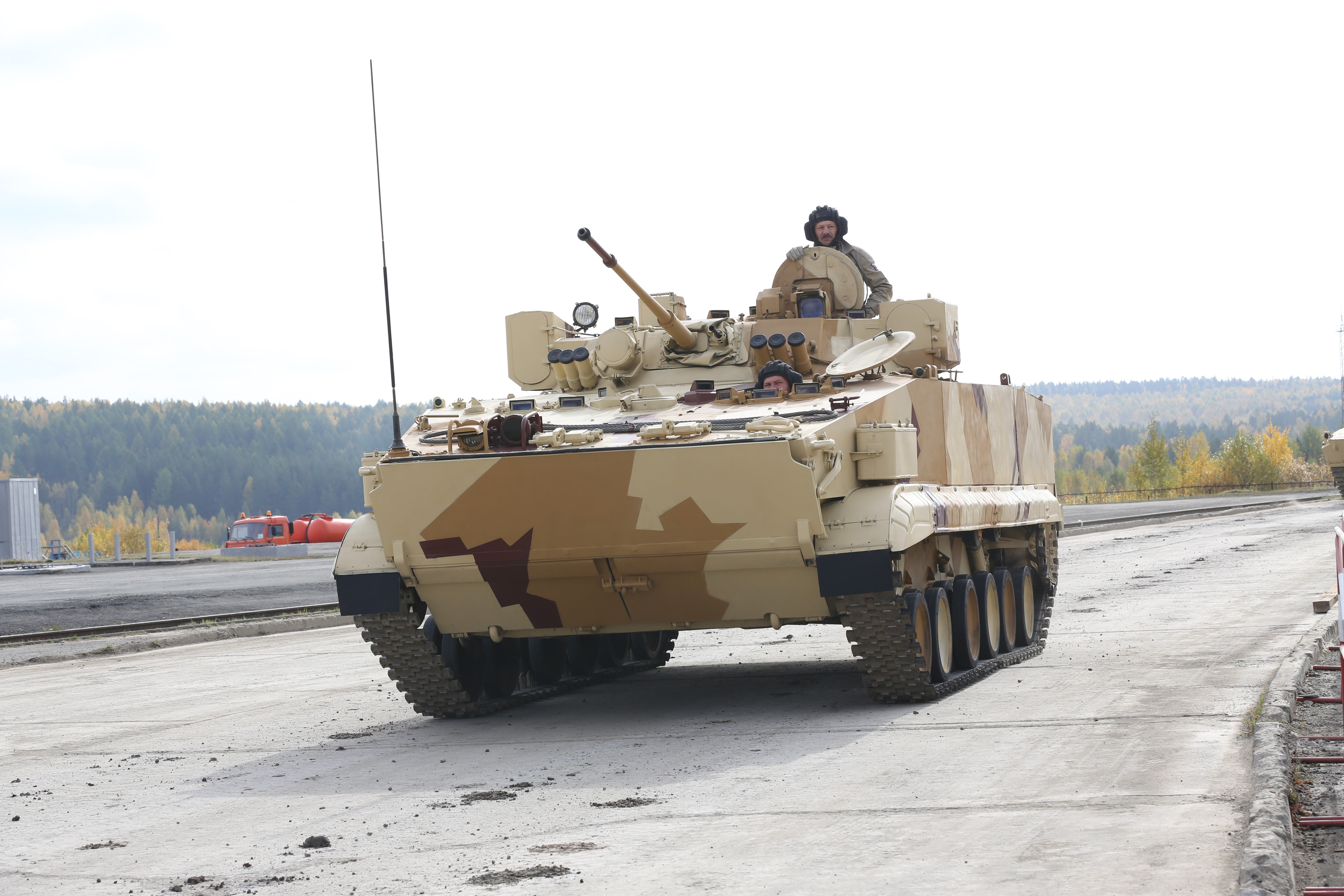 Military vehicle with camouflage pattern HD Wallpaper