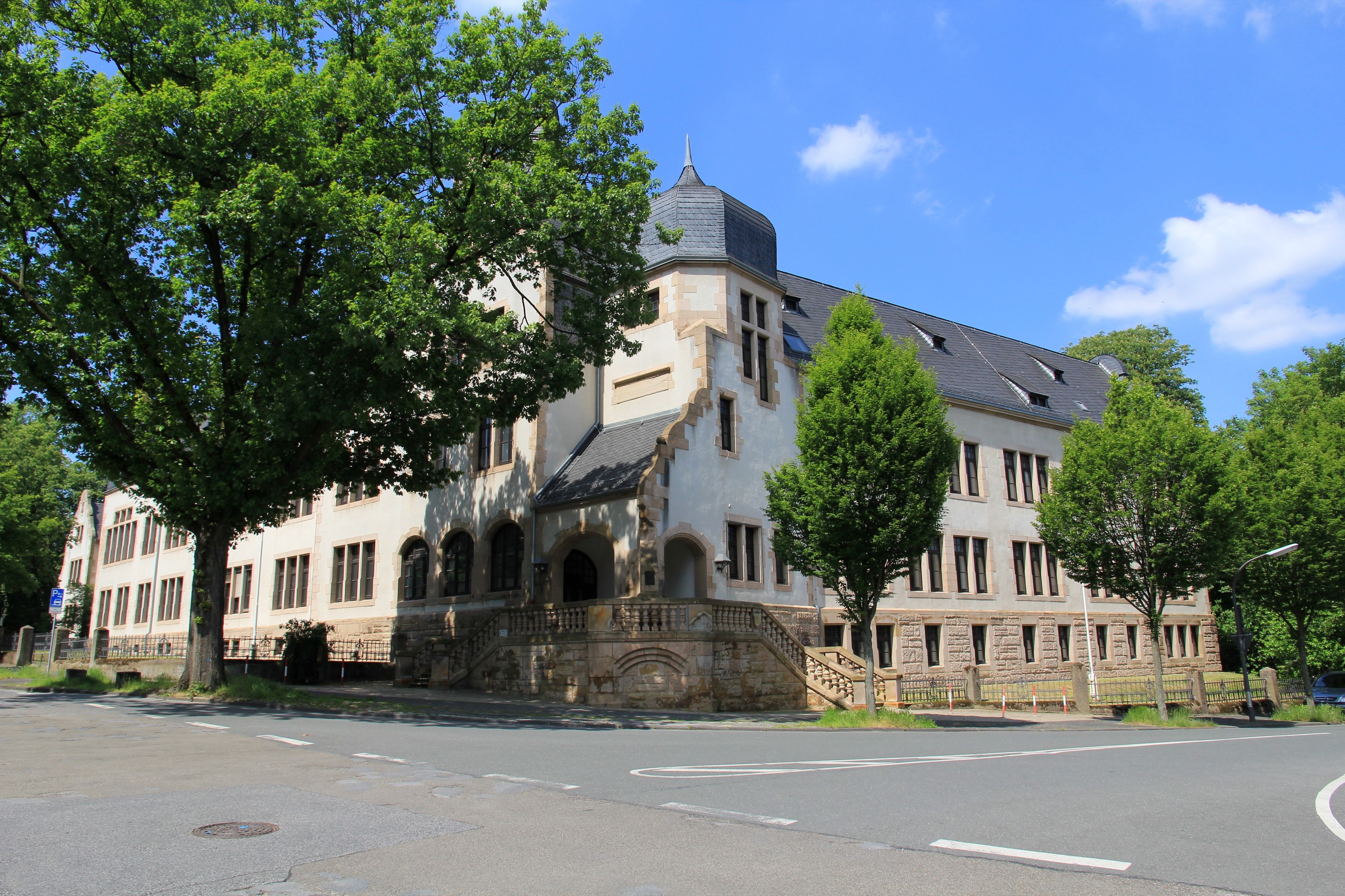 Building with trees in Recklinghausen, Germany HD Wallpaper