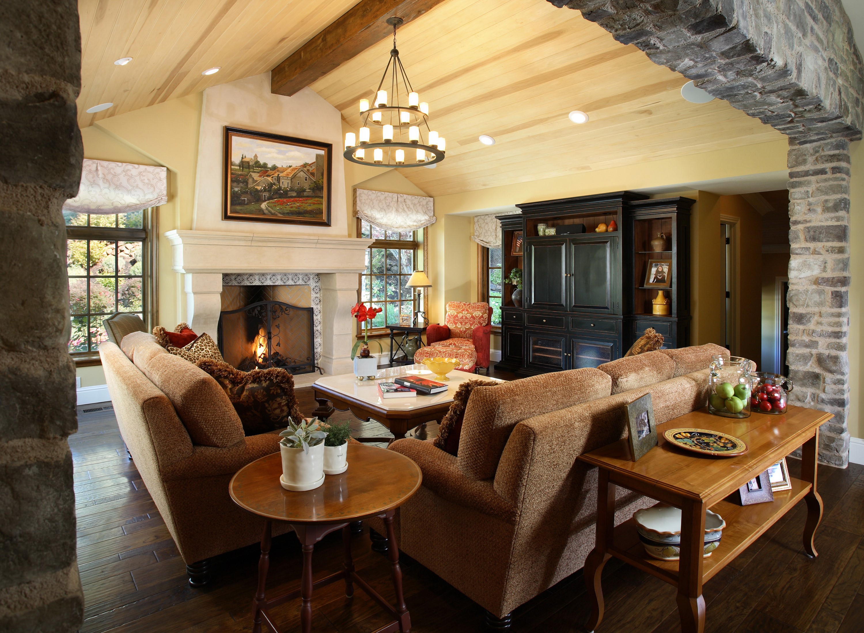Living room with fireplace, sofas, and entertainment center HD Wallpaper