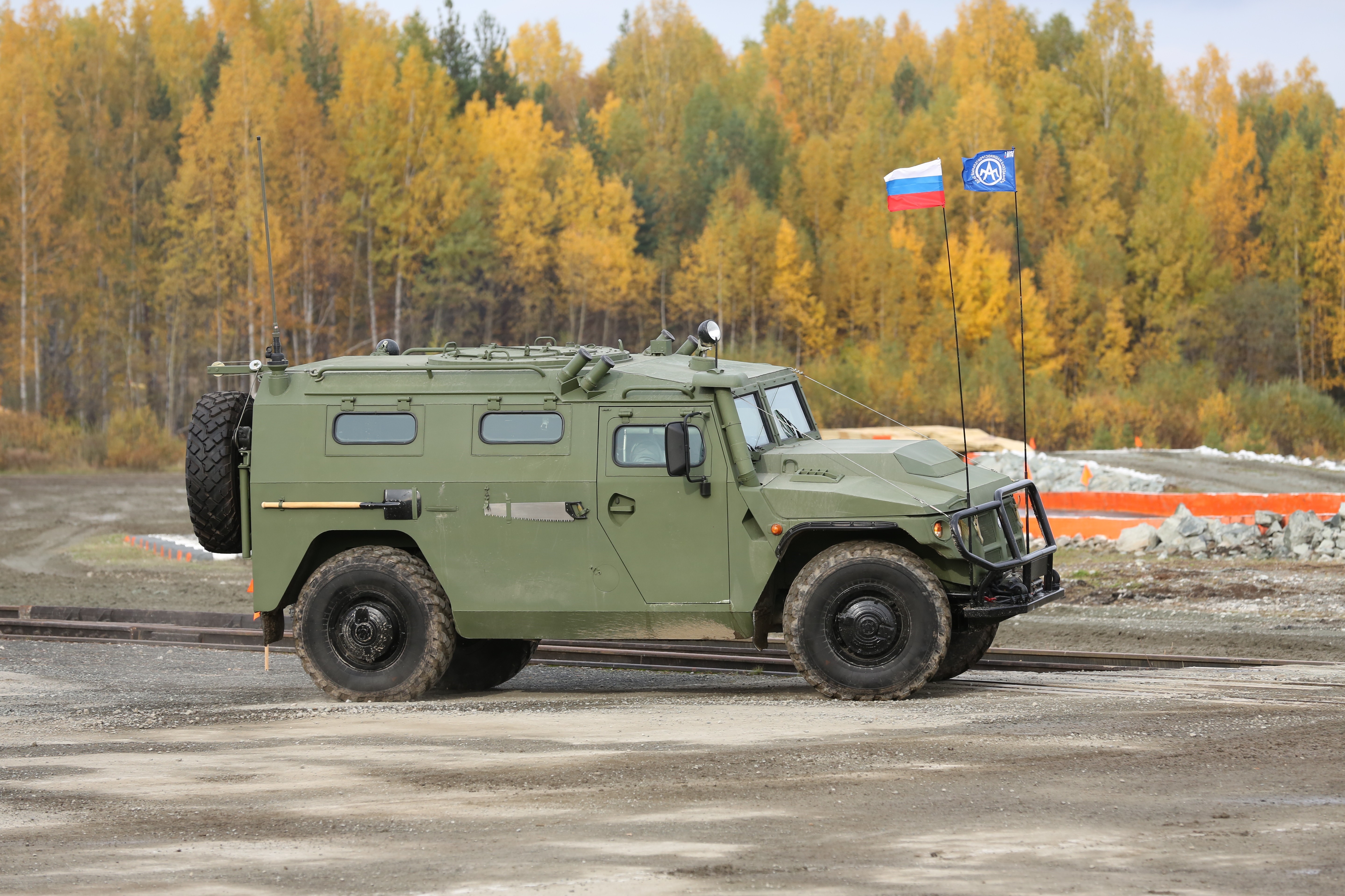 Tiger-M SPN military vehicle with flags HD Wallpaper