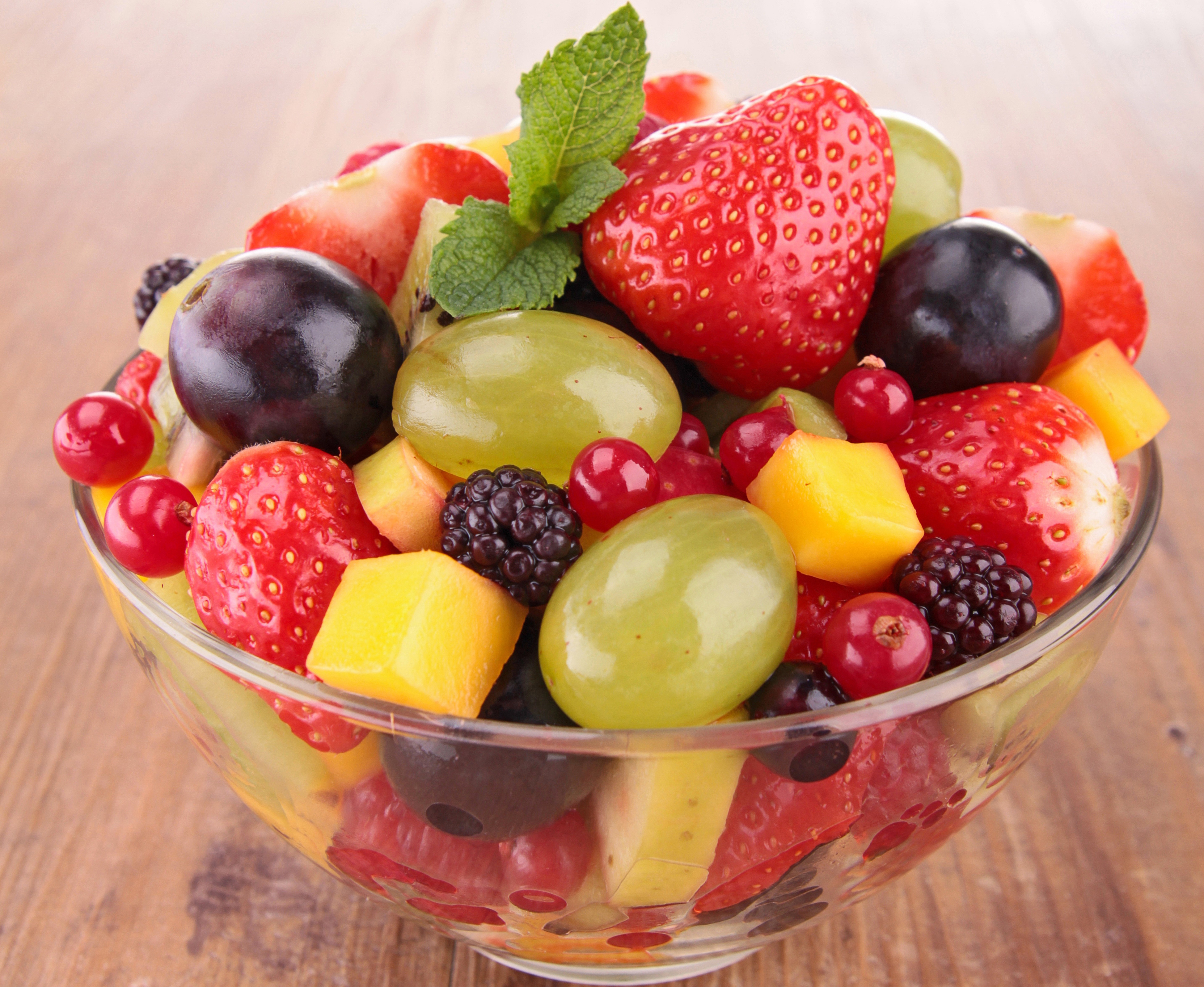 Fruit salad with strawberries, grapes, blackberries, and mango HD Wallpaper