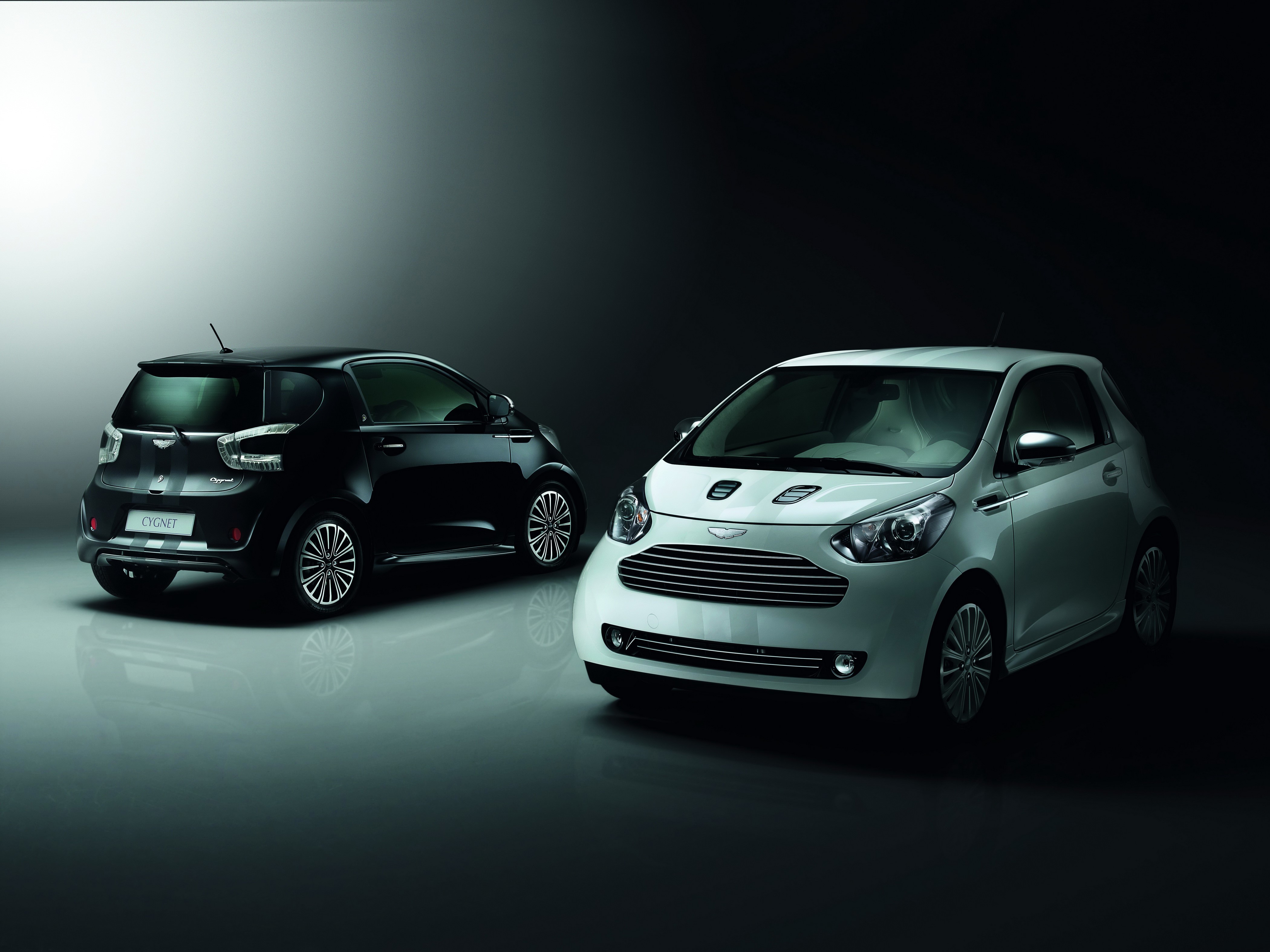 Two Aston Martin Cygnet cars HD Wallpaper