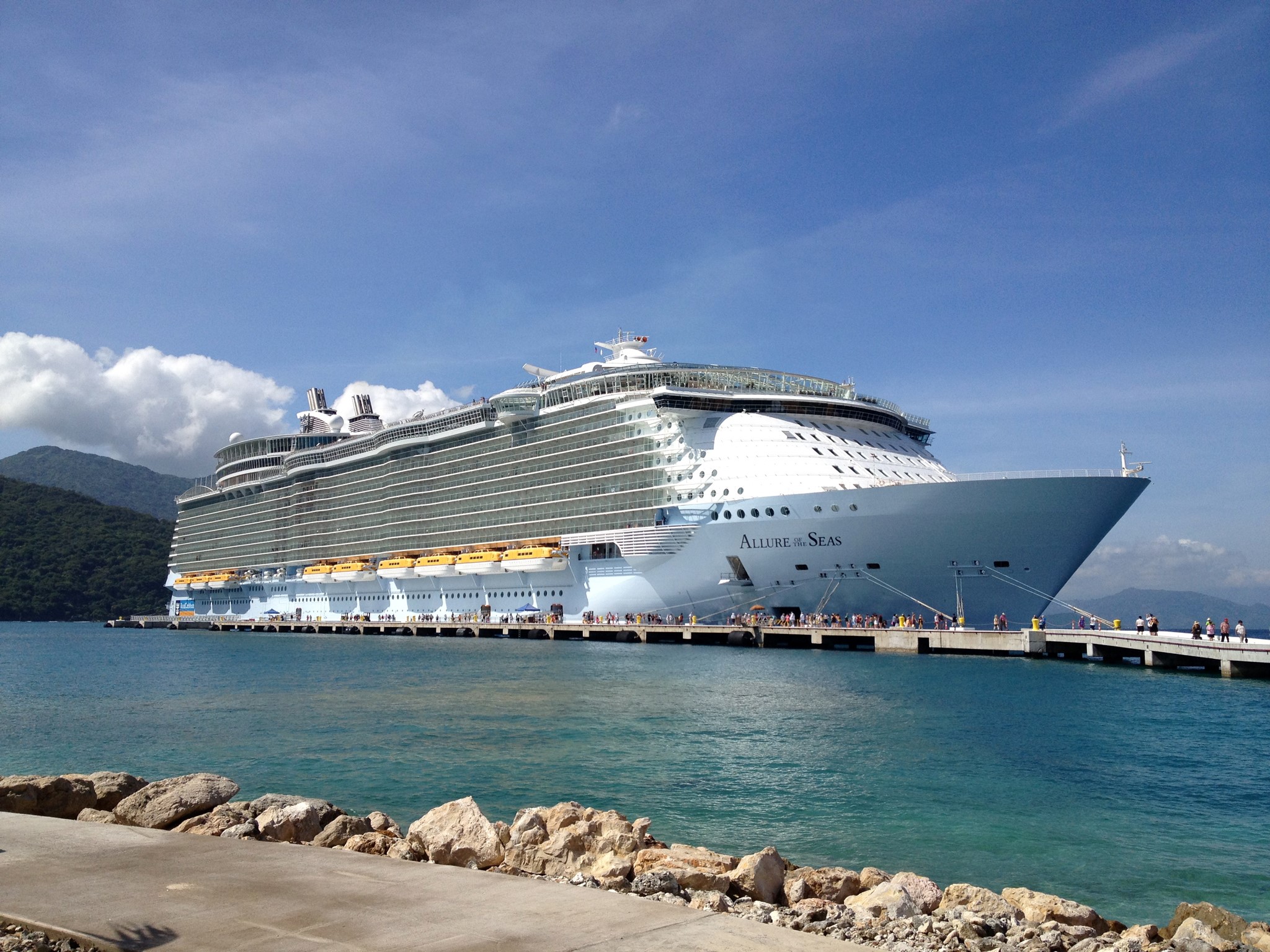 Allure of the Seas cruise ship docked at a pier HD Wallpaper
