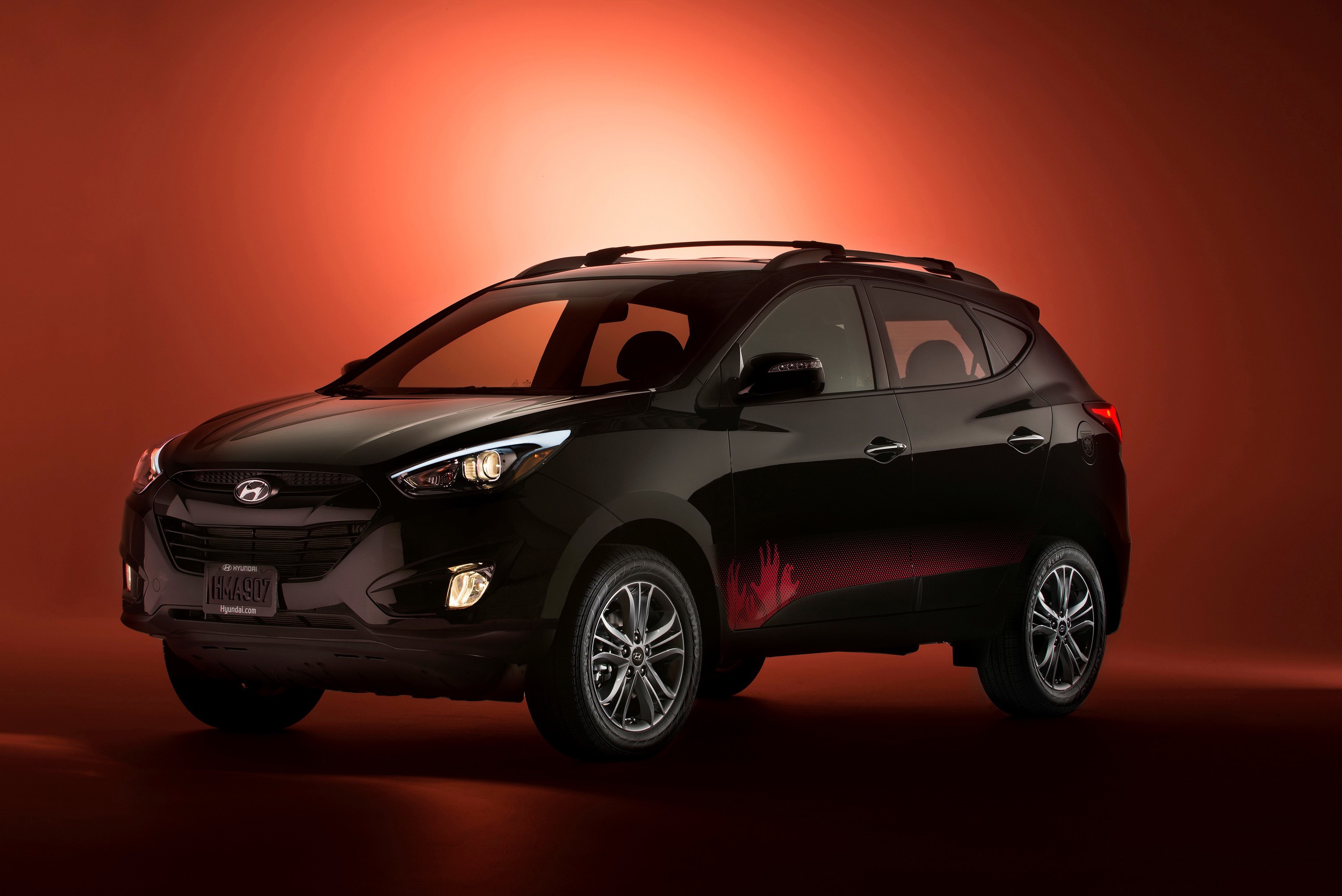 Black Hyundai Tucson with red accents HD Wallpaper