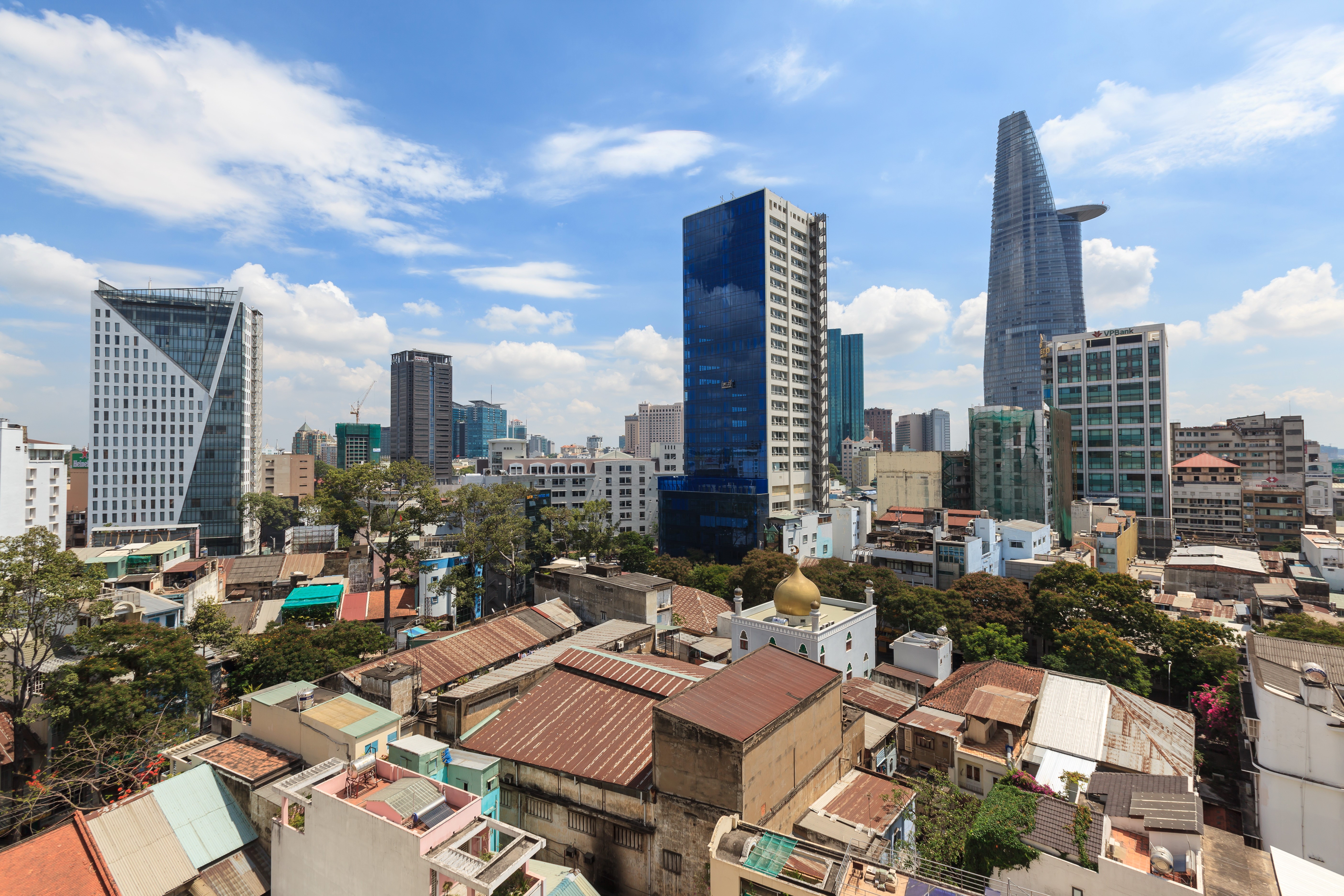 Ho Chi Minh City Vietnam Skyline with Buildings and Houses HD Wallpaper