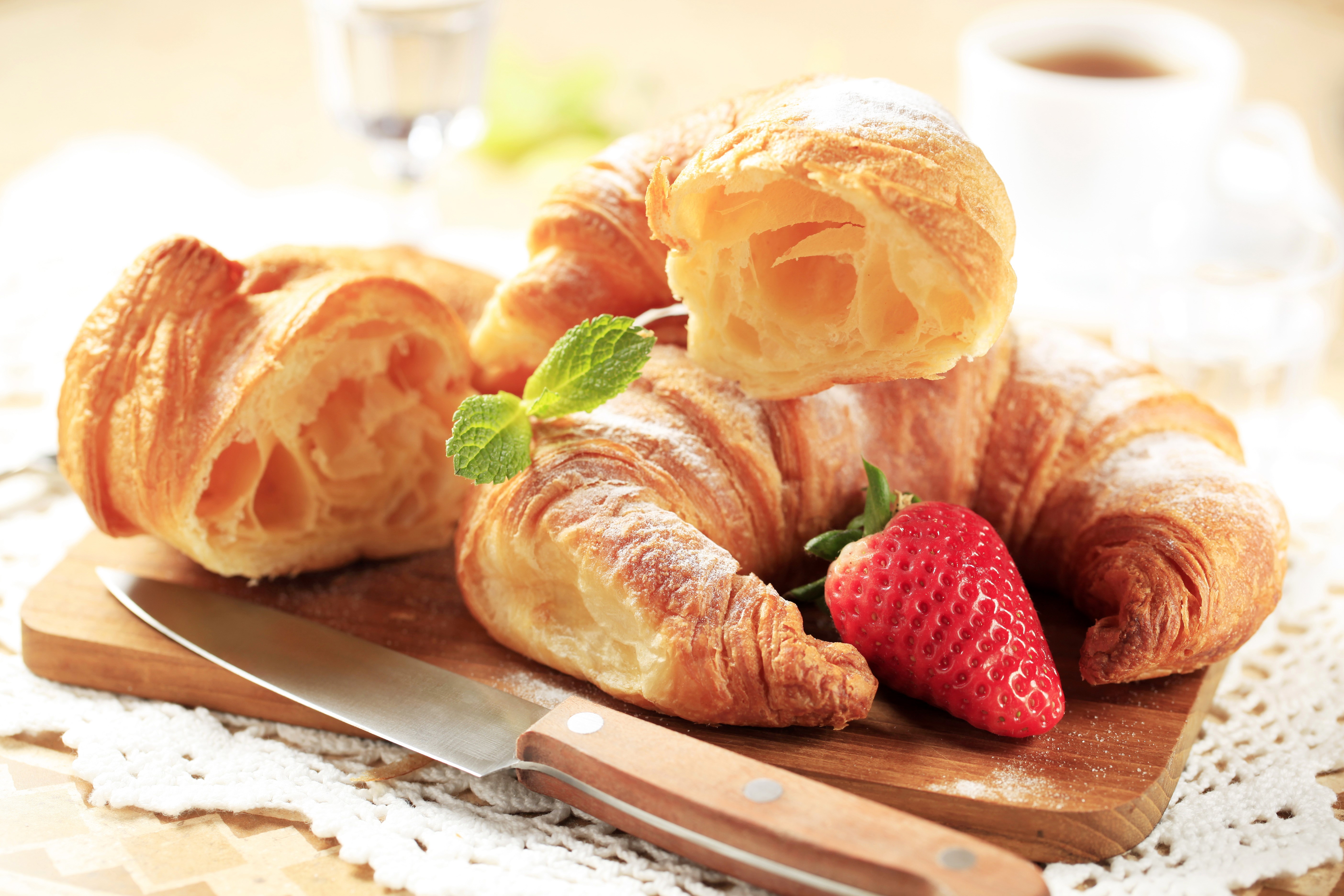 Croissants with strawberry and mint on a wooden board HD Wallpaper
