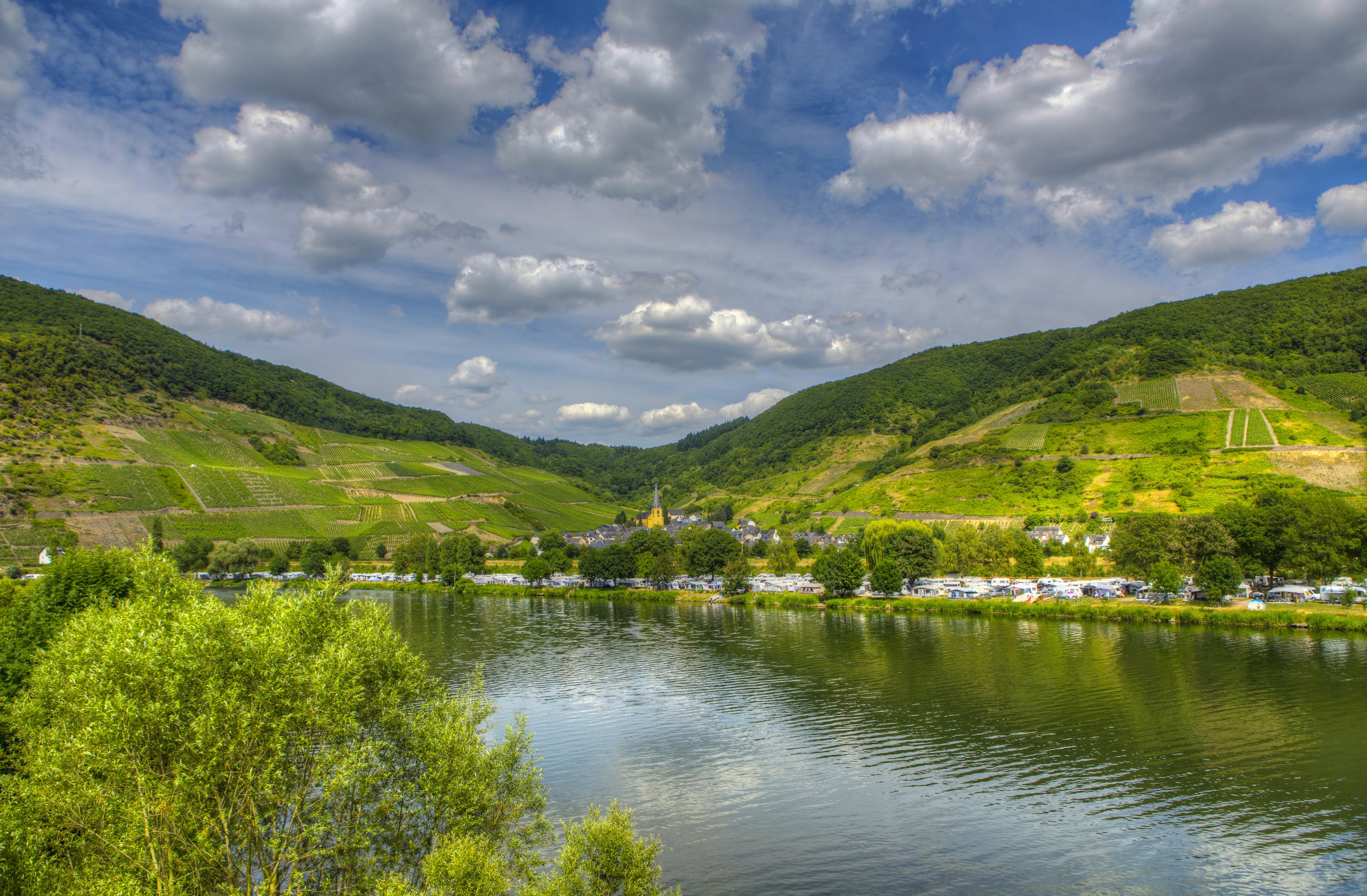 River valley with vineyards and village in Germany HD Wallpaper