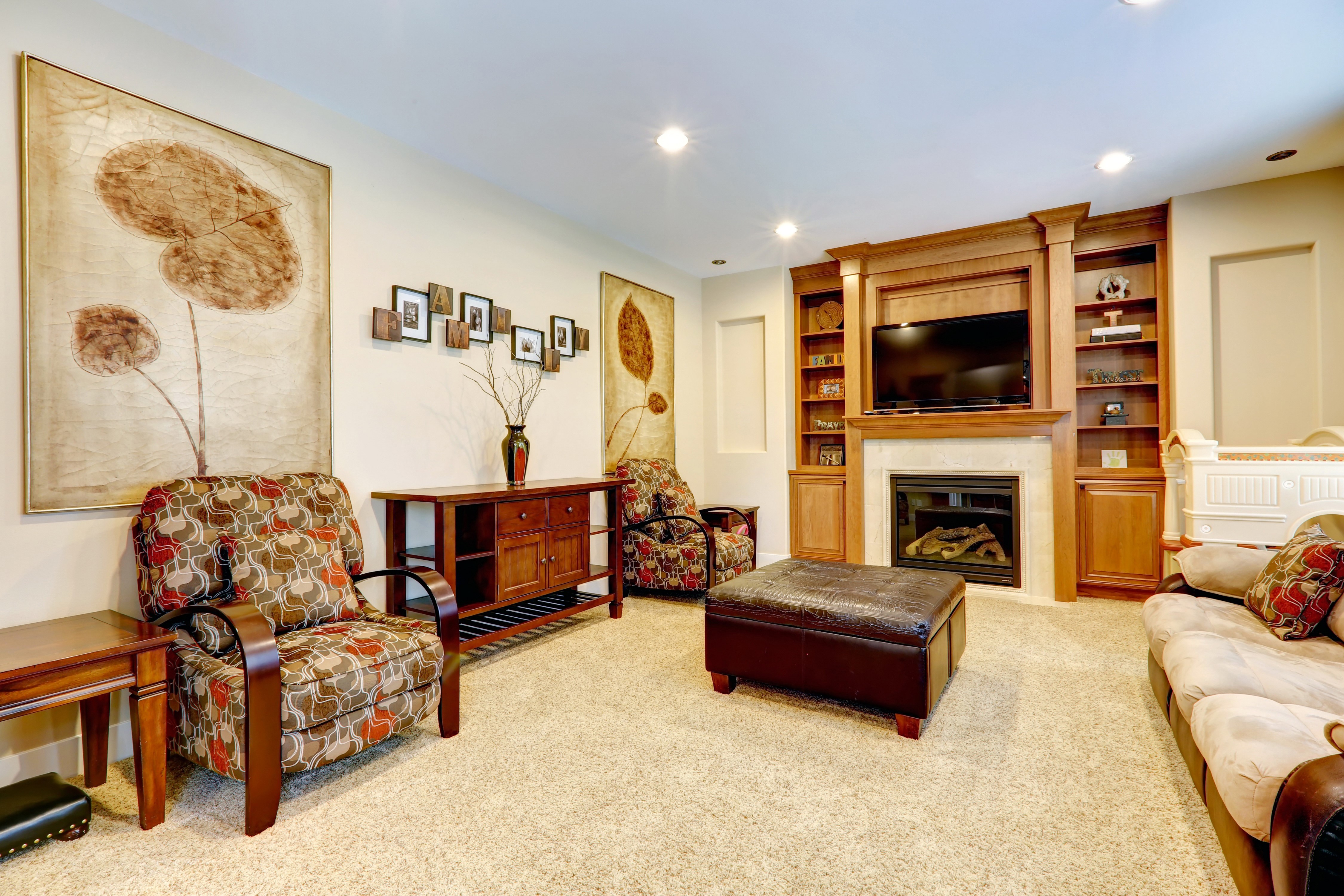 Living room with fireplace and armchairs HD Wallpaper