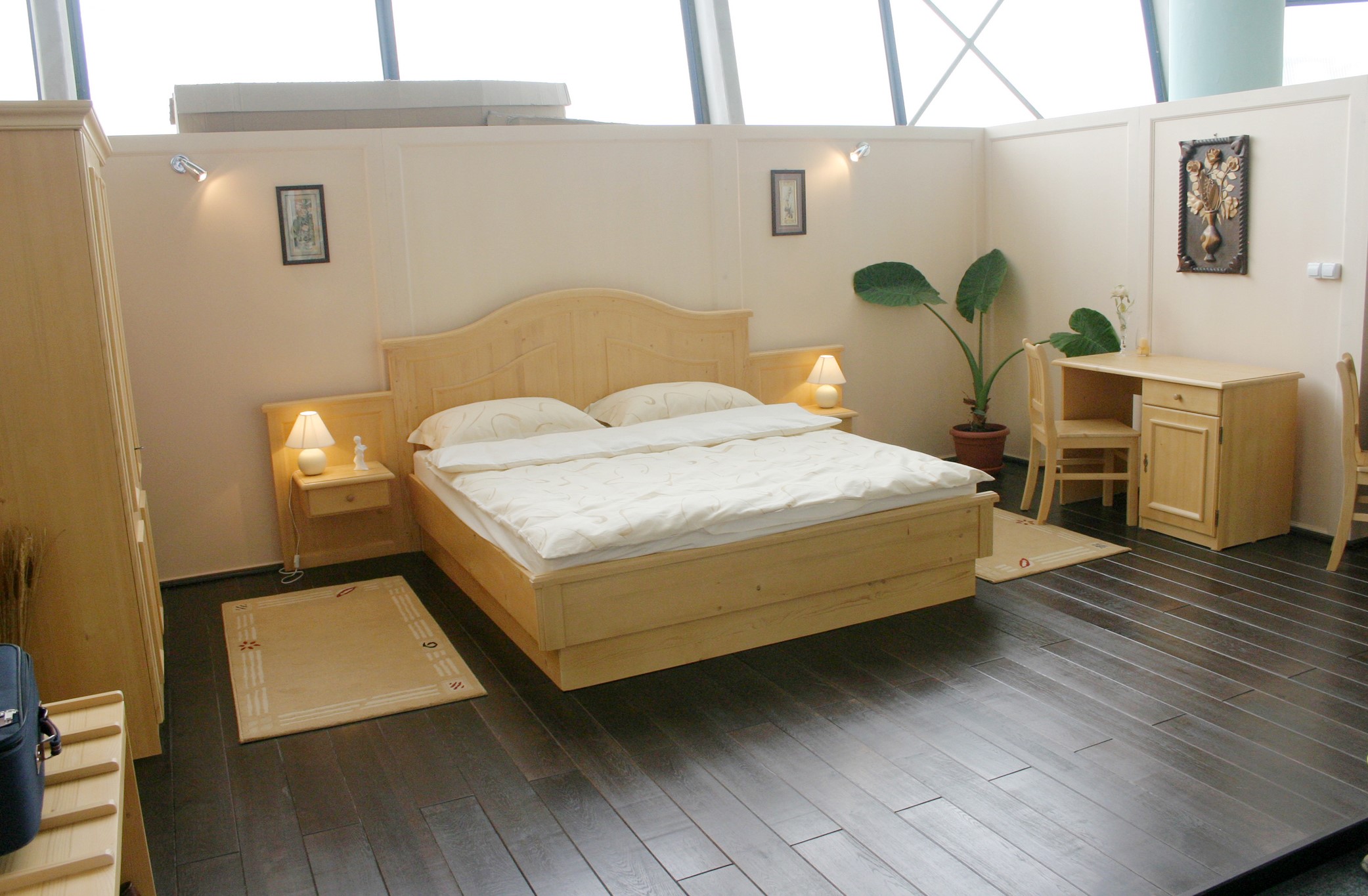 Bedroom with wooden furniture and dark floor HD Wallpaper