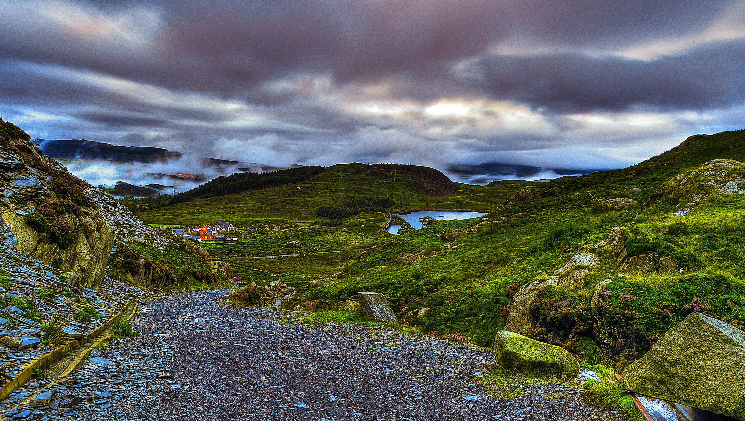 Mountain landscape with a lake and village in the UK HD Wallpaper