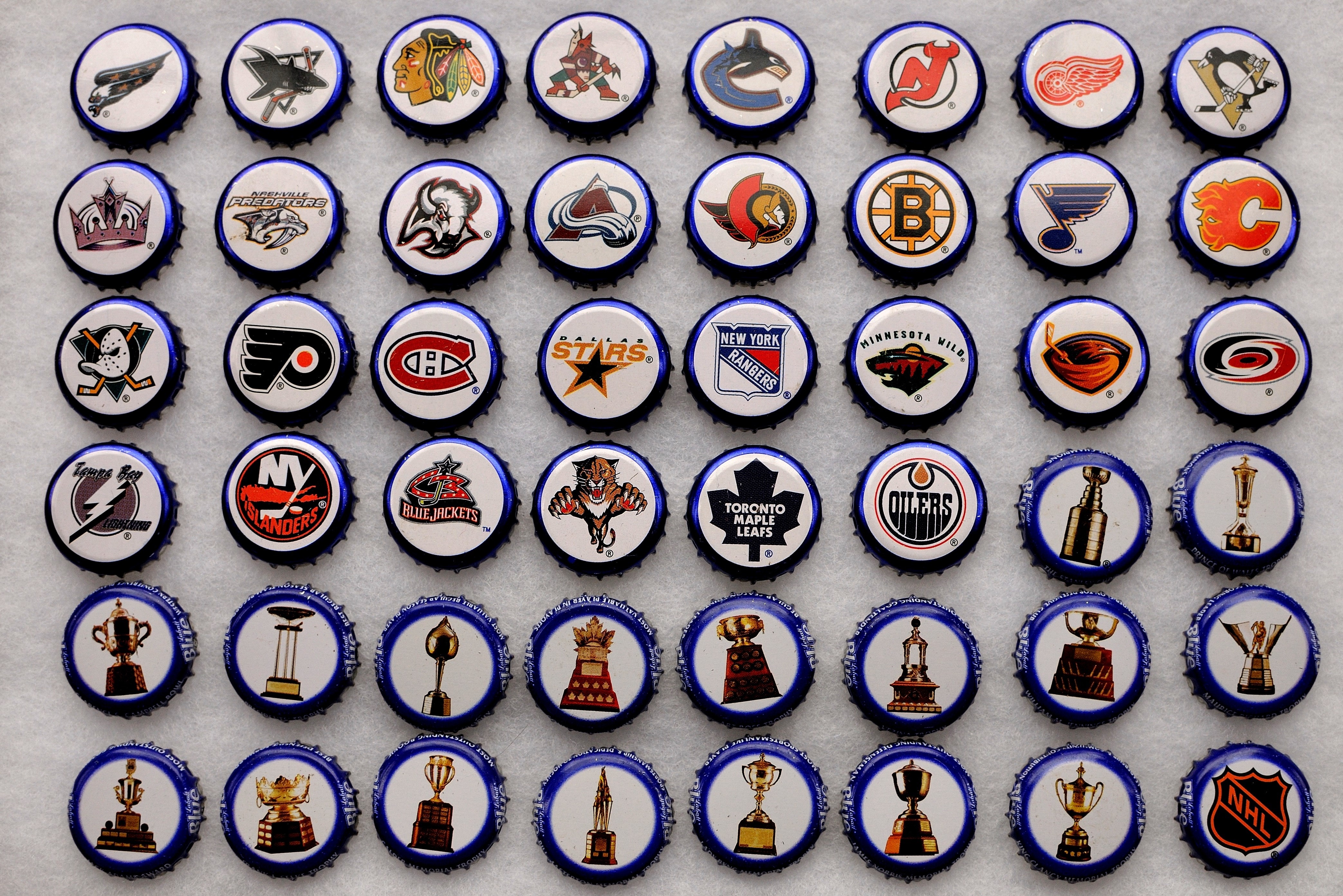 NHL Hockey Team Logos and Trophies Bottle Caps HD Wallpaper