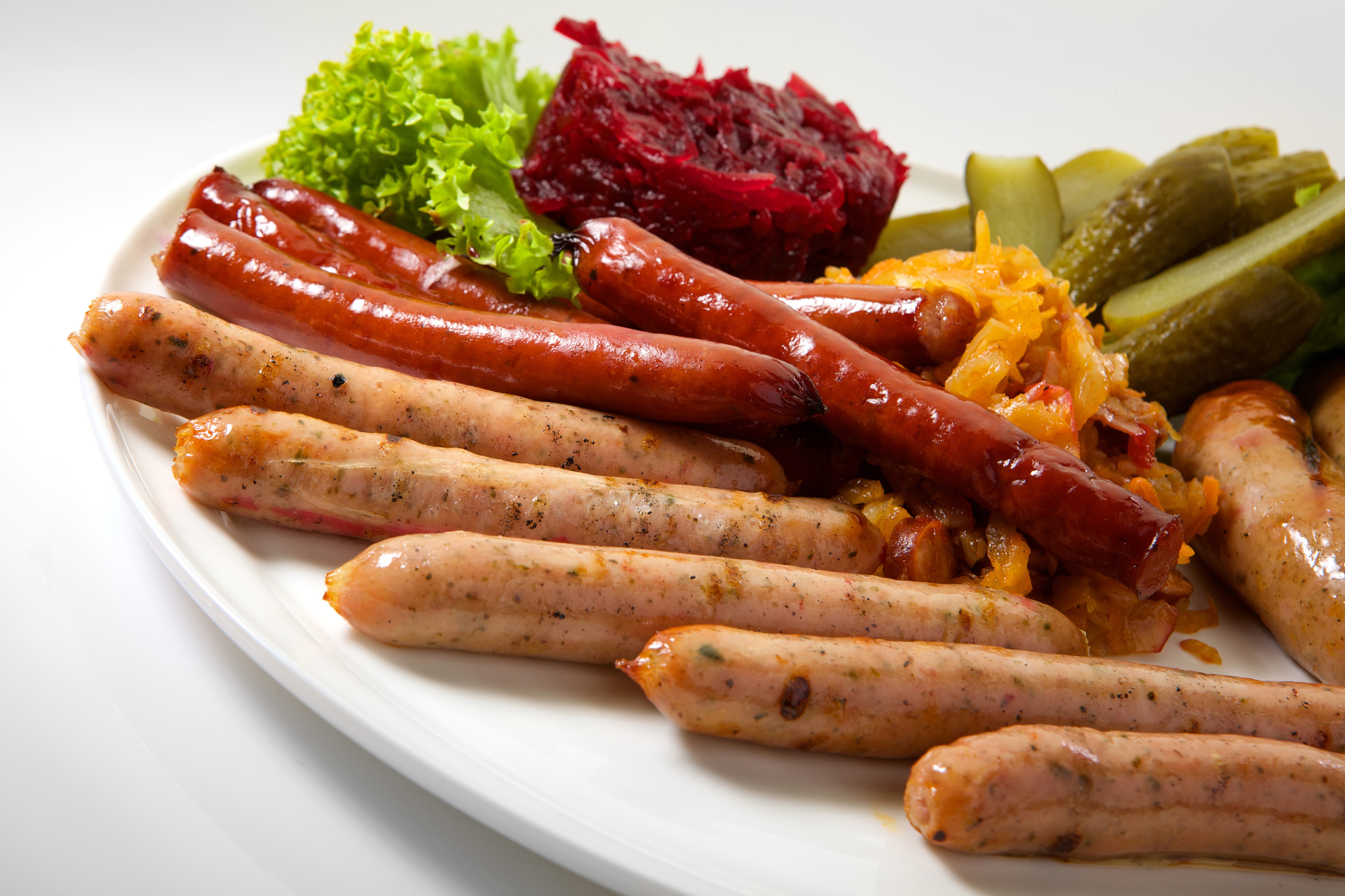 Sausages with Sauerkraut, Pickles, and Salad HD Wallpaper
