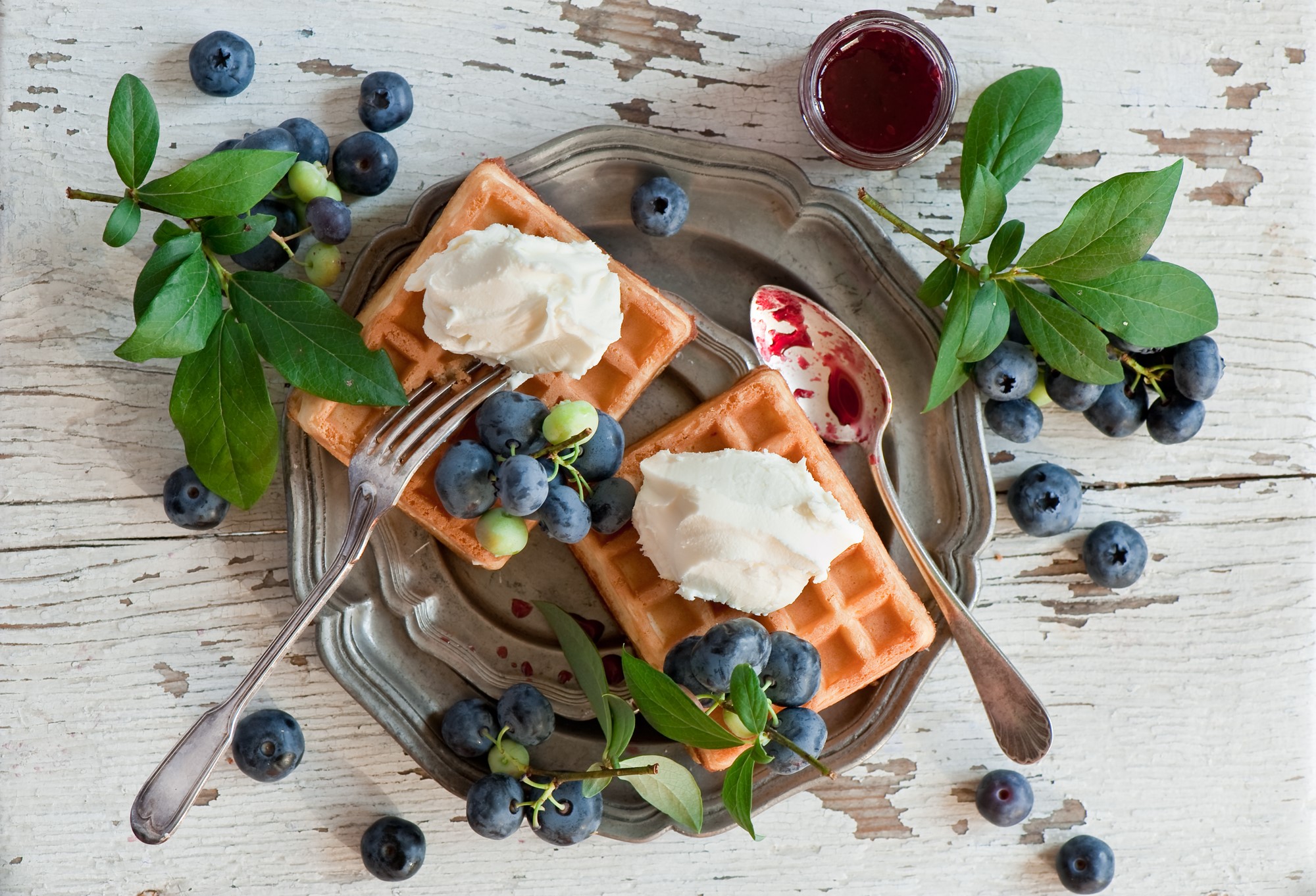 Waffles with blueberries and whipped cream on a platter HD Wallpaper