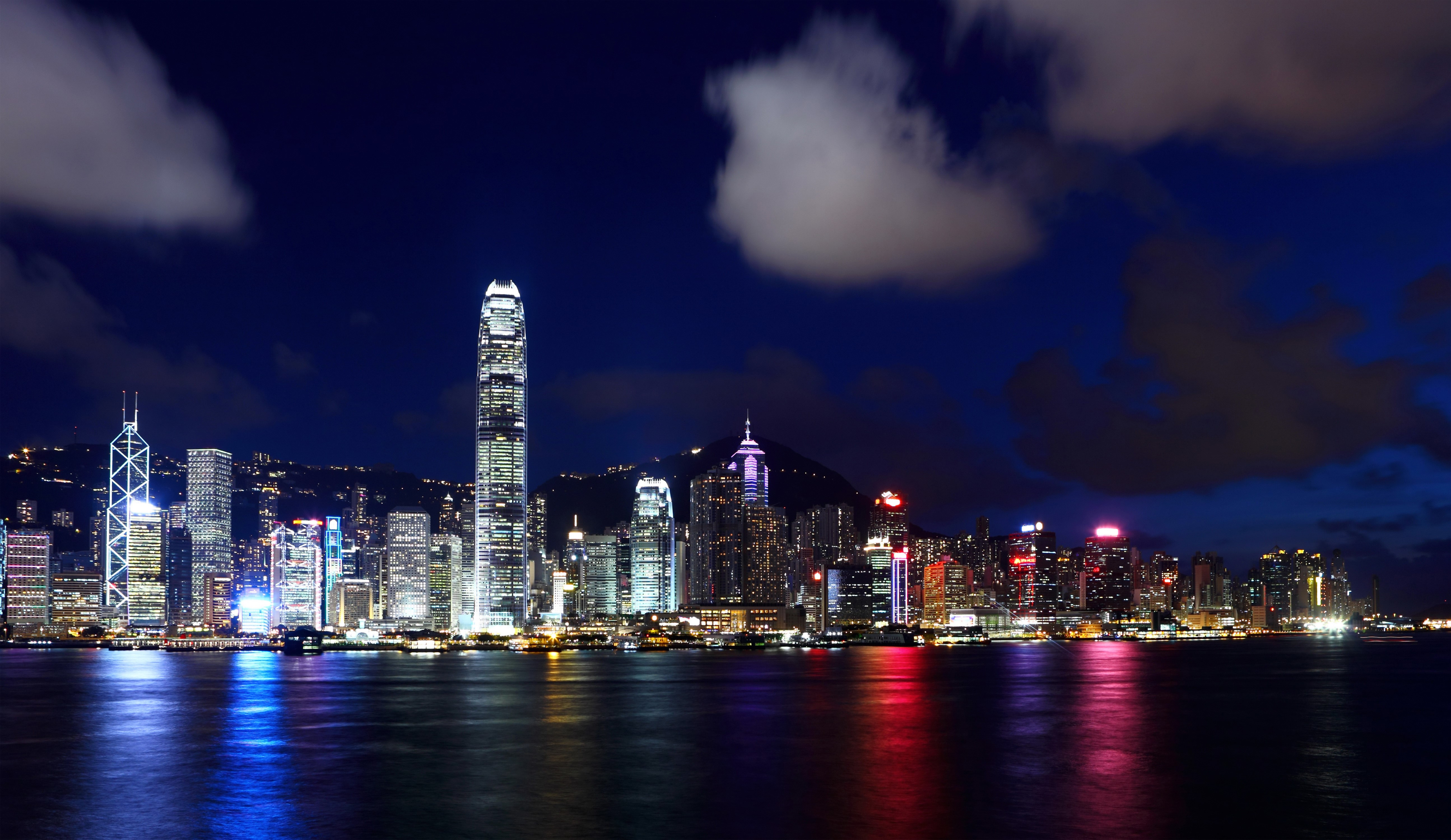 Hong Kong skyline at night with reflections HD Wallpaper