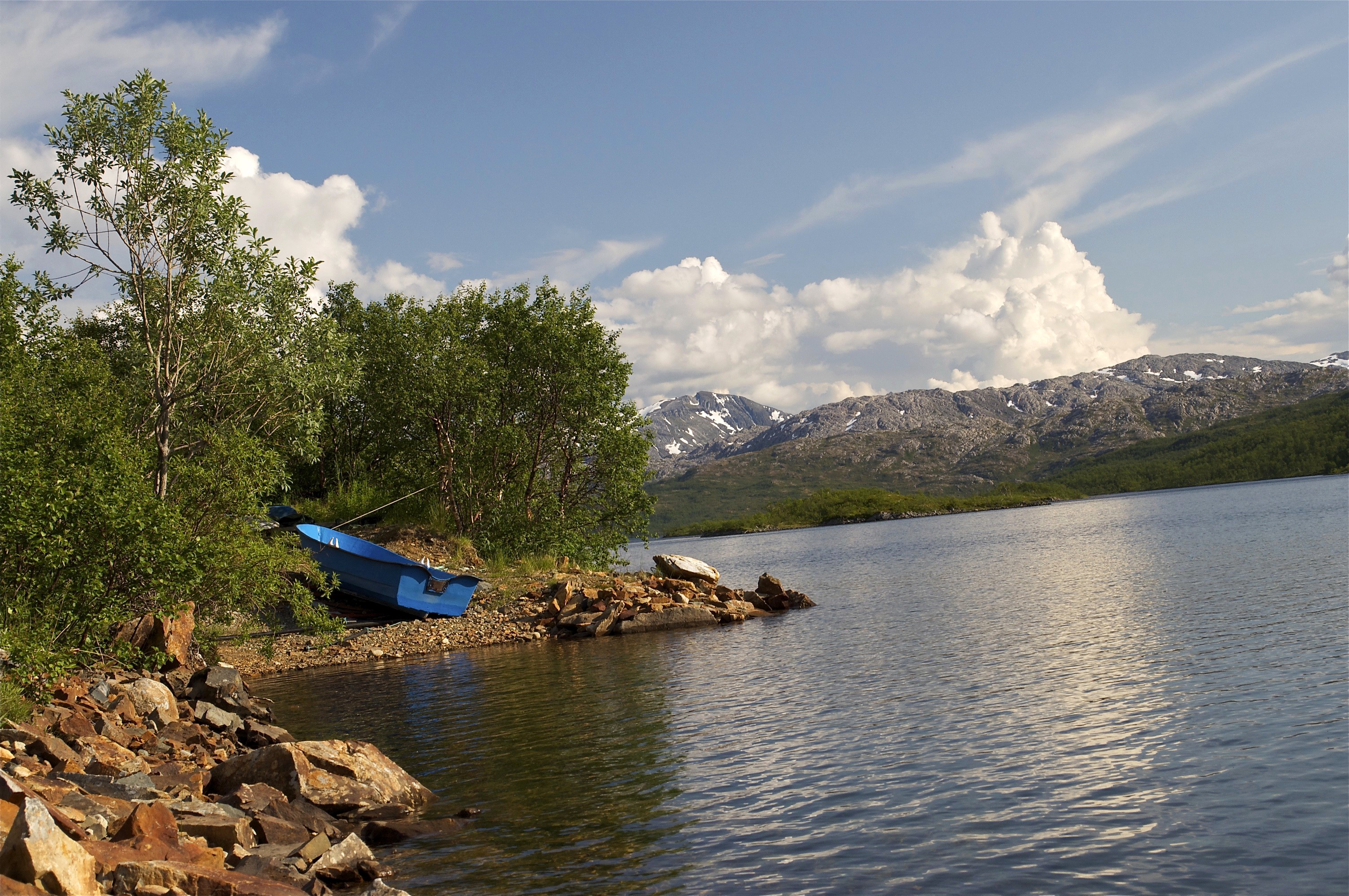 Blue boat on the shore of a lake in Norway HD Wallpaper