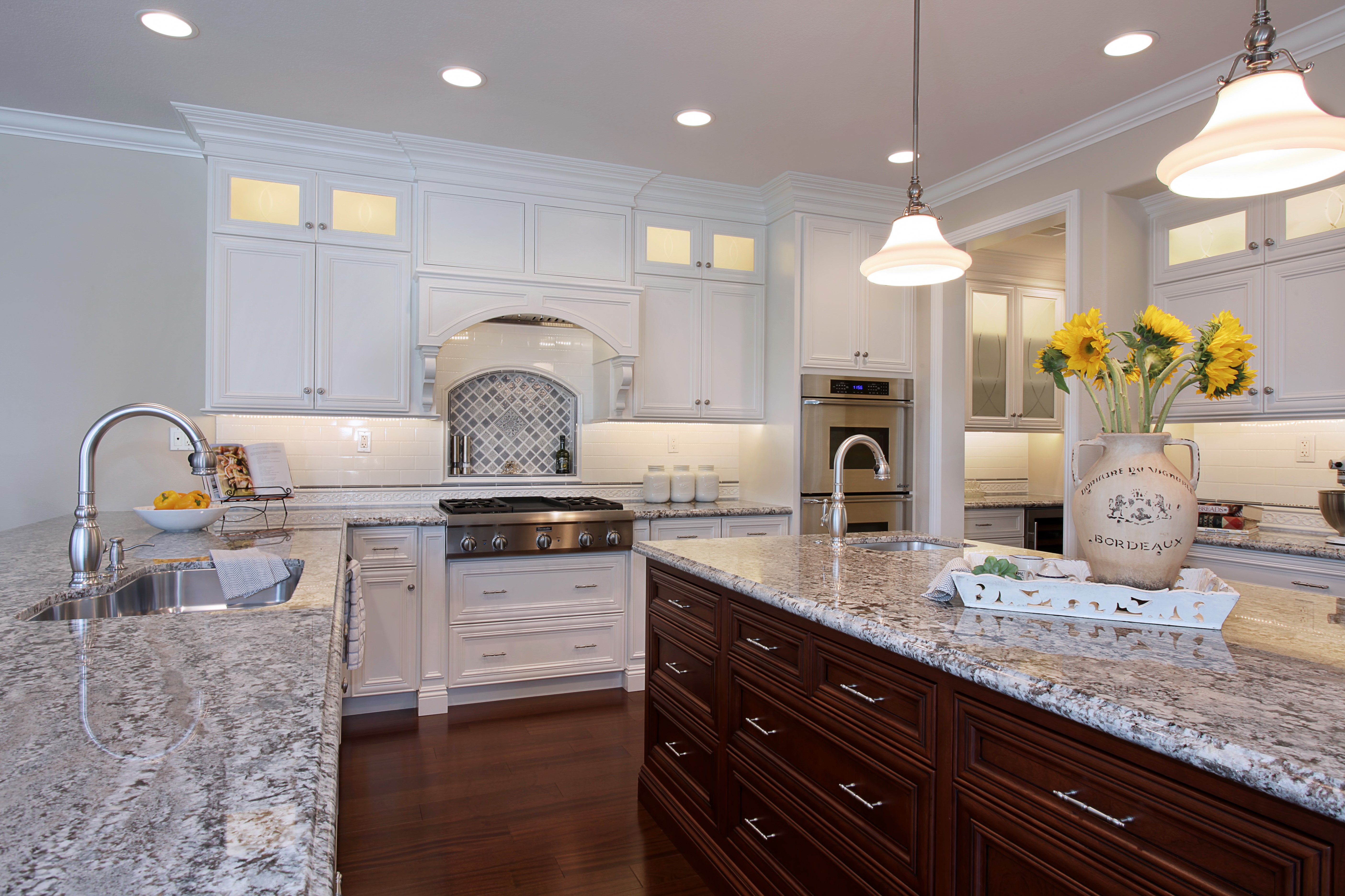 Kitchen with white cabinets and island HD Wallpaper
