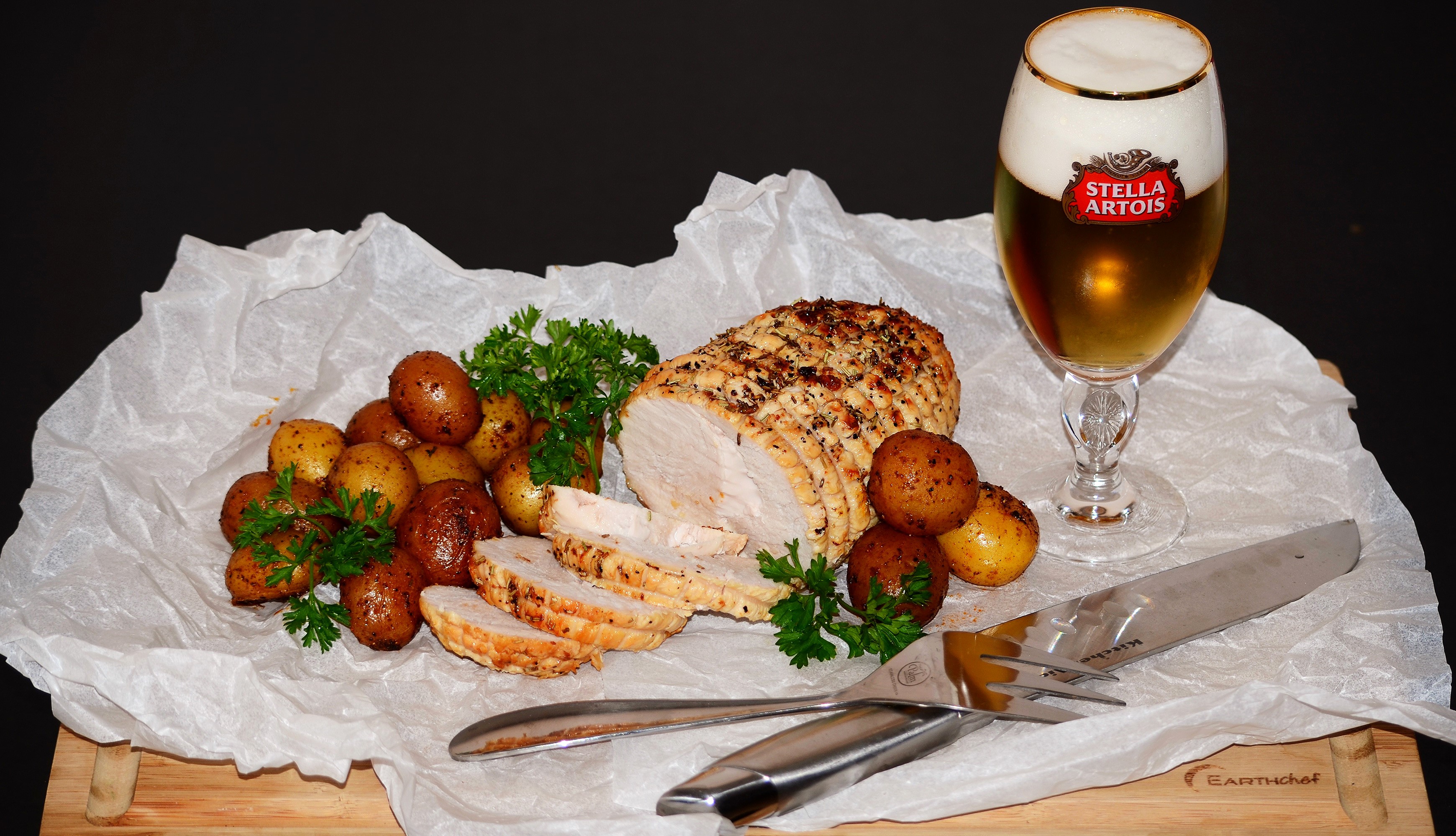 Roast meat with potatoes and Stella Artois beer HD Wallpaper