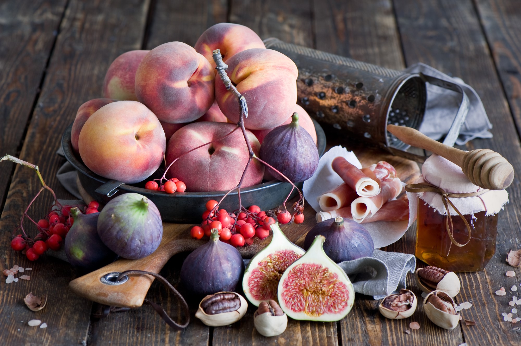 Still-life of peaches, figs, honey, nuts, and ham HD Wallpaper