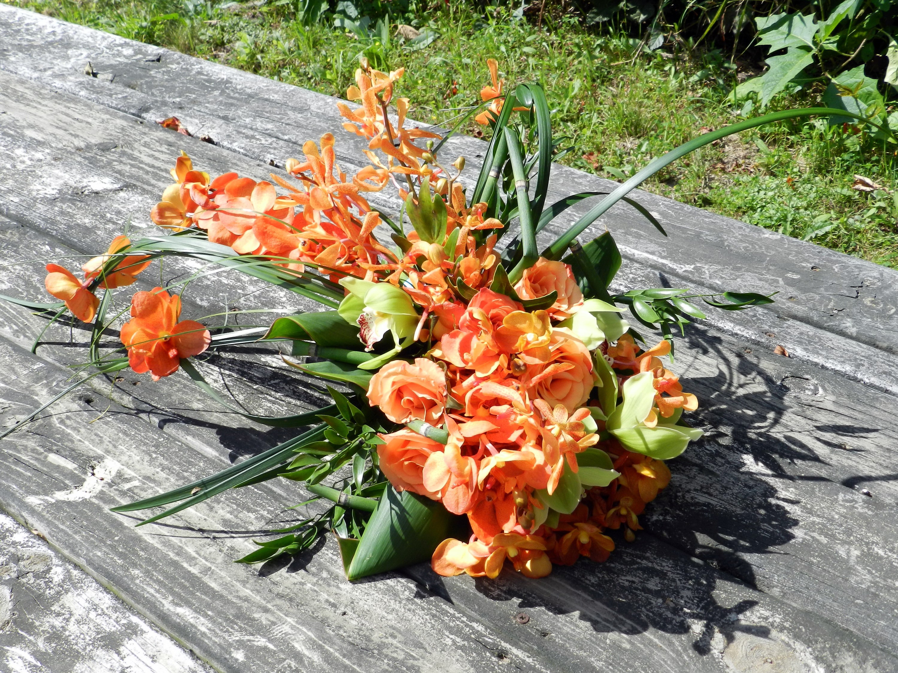 Orange Roses and Orchids Bouquet on Wooden Table HD Wallpaper