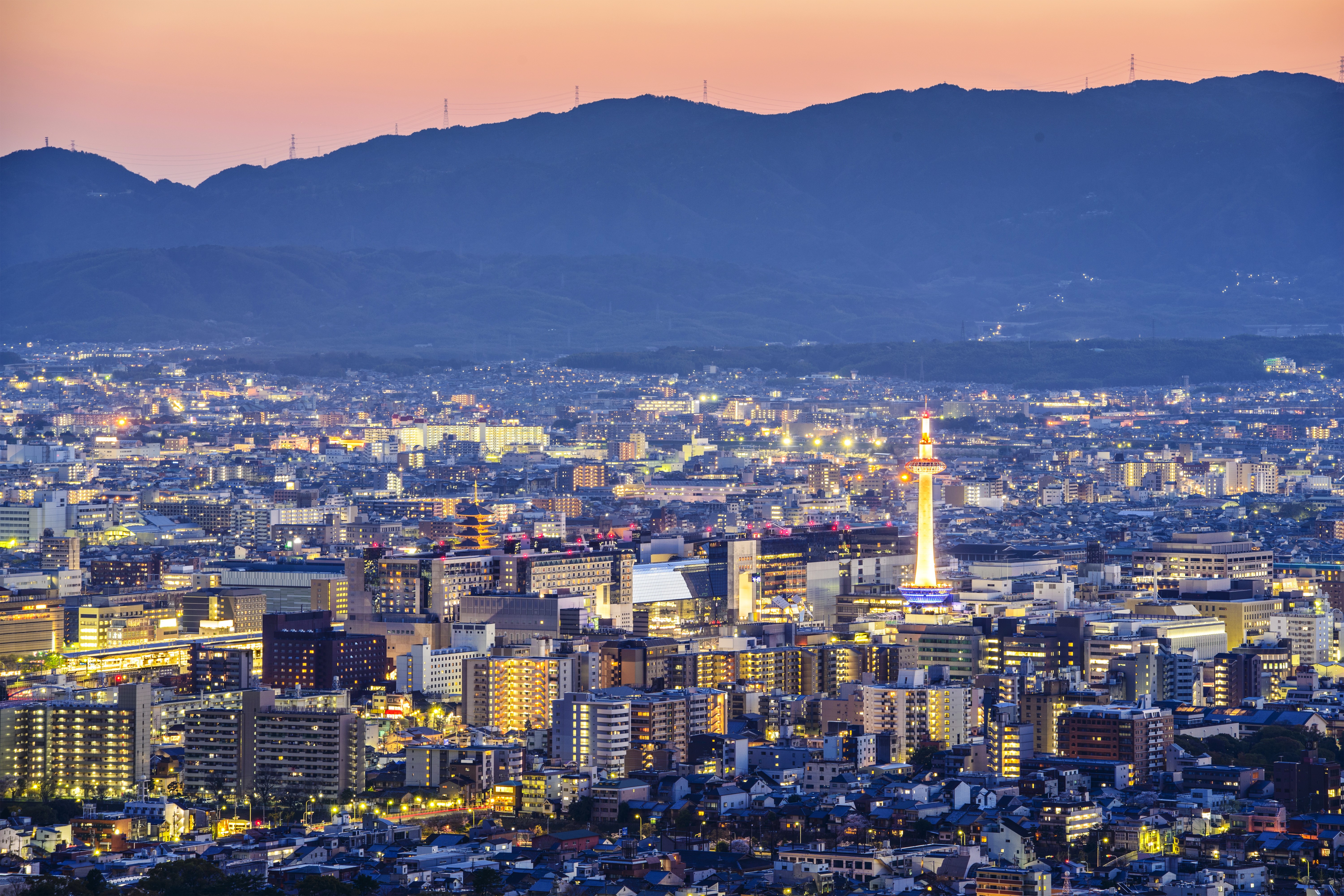 Kyoto cityscape with Kyoto Tower at dusk HD Wallpaper