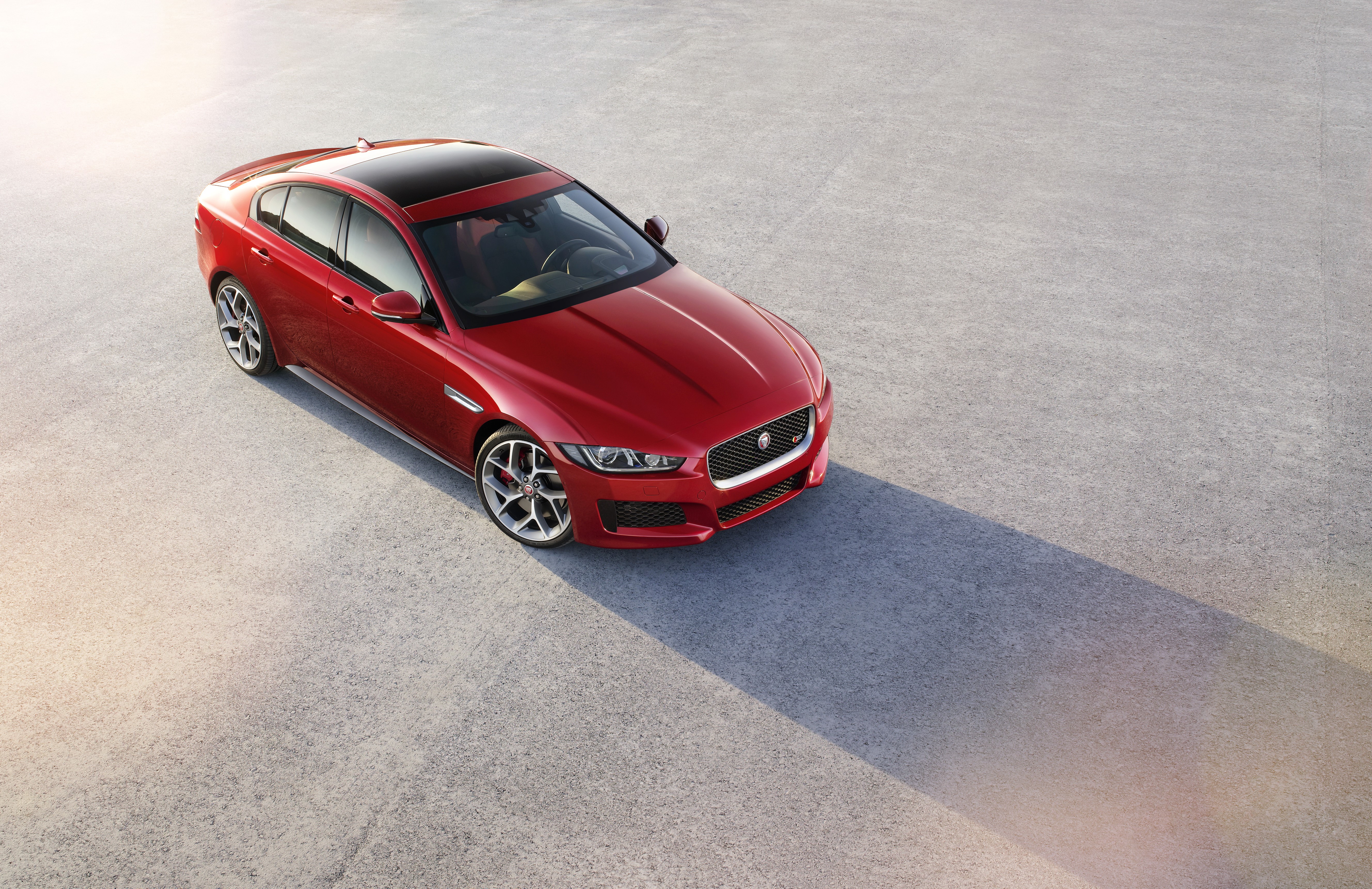 Red Jaguar XE from above HD Wallpaper