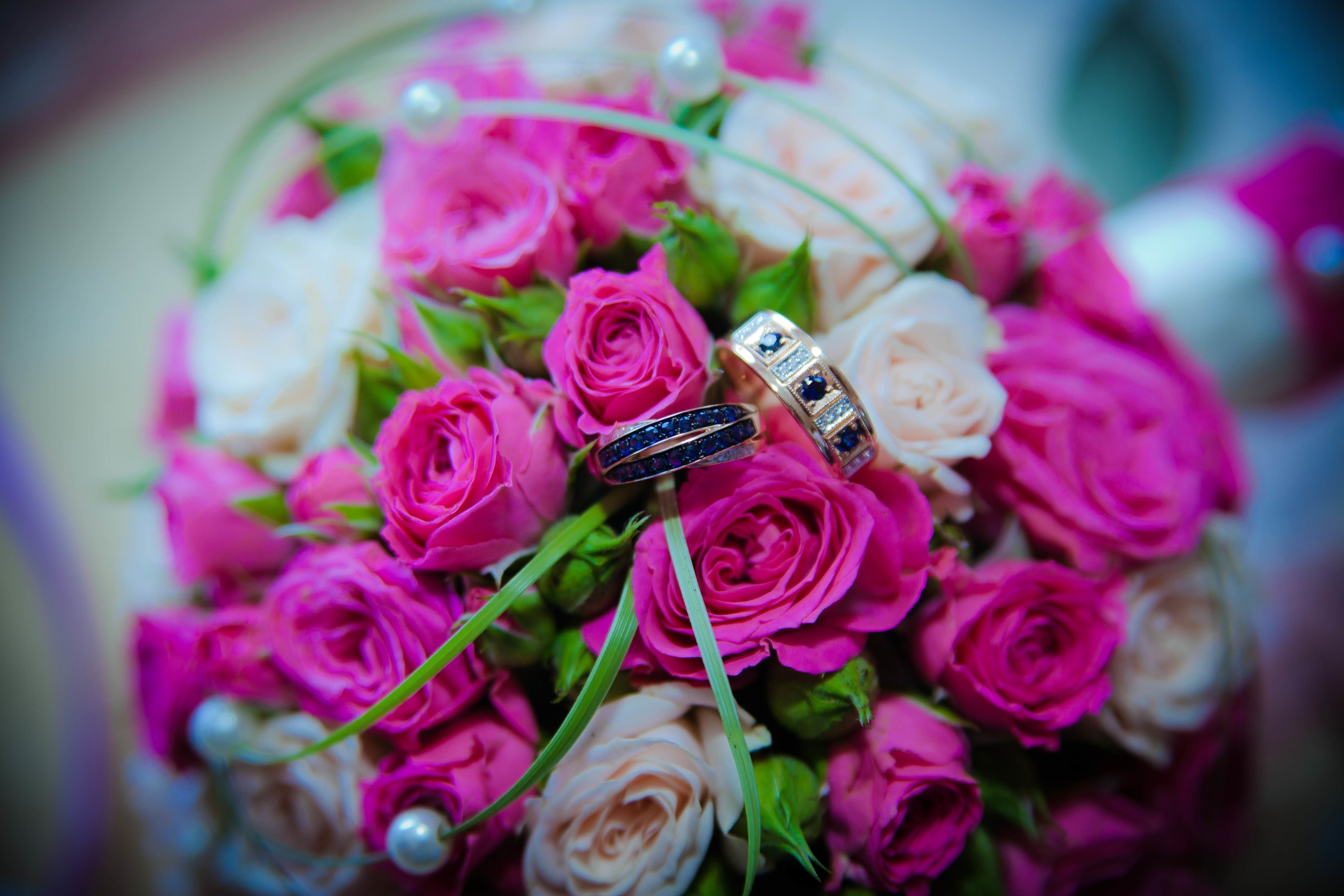 Wedding Rings on a Bouquet of Roses HD Wallpaper