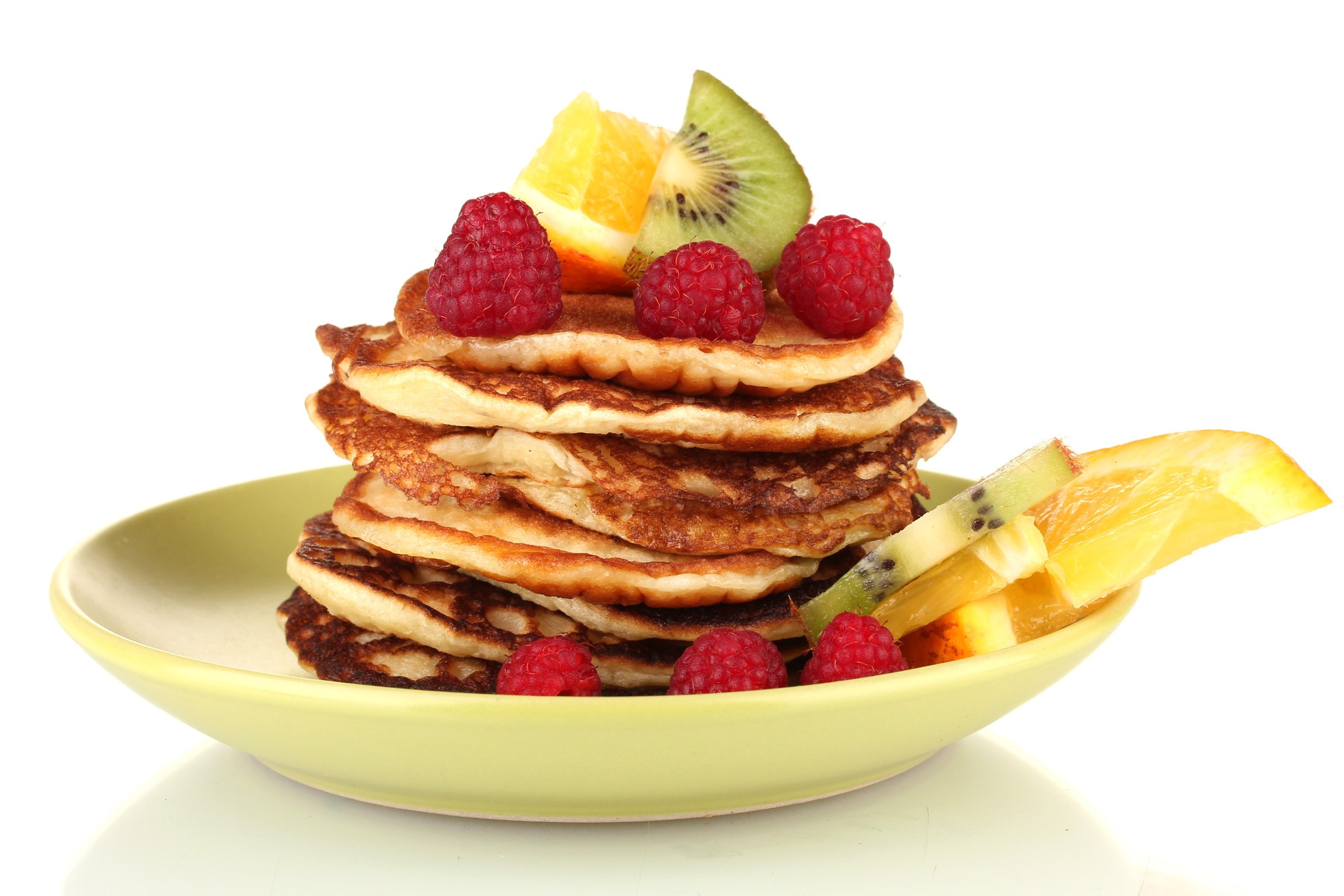 Stack of pancakes with raspberries and fruit on a plate HD Wallpaper