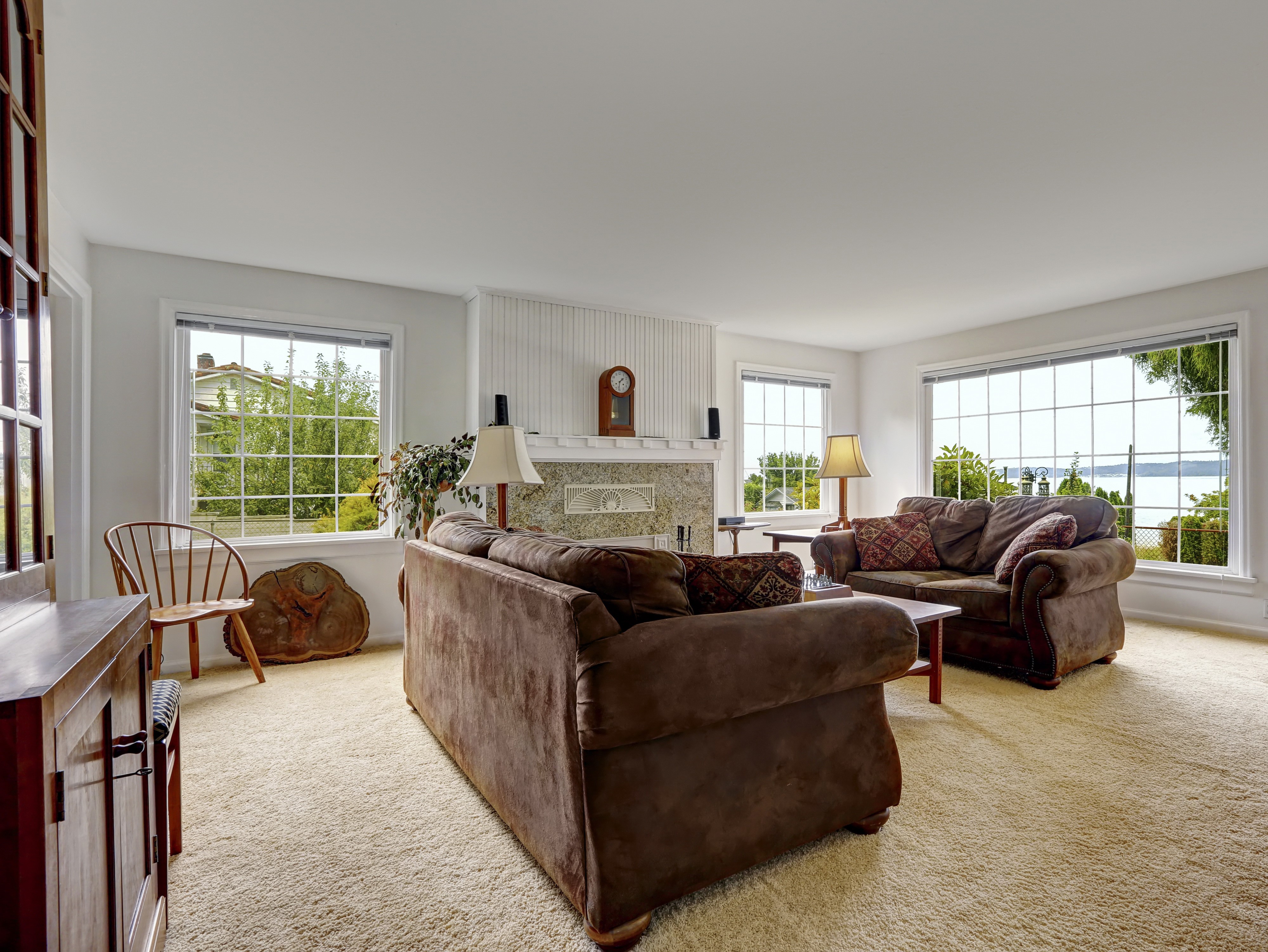 Living room with sofas and fireplace HD Wallpaper