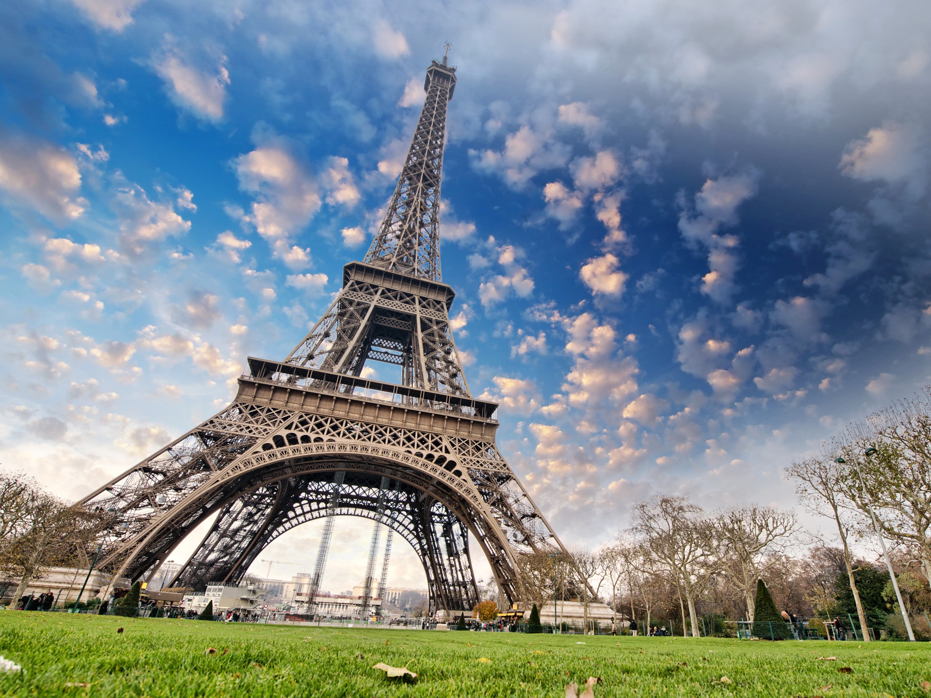 Eiffel Tower in Paris under a cloudy sky HD Wallpaper