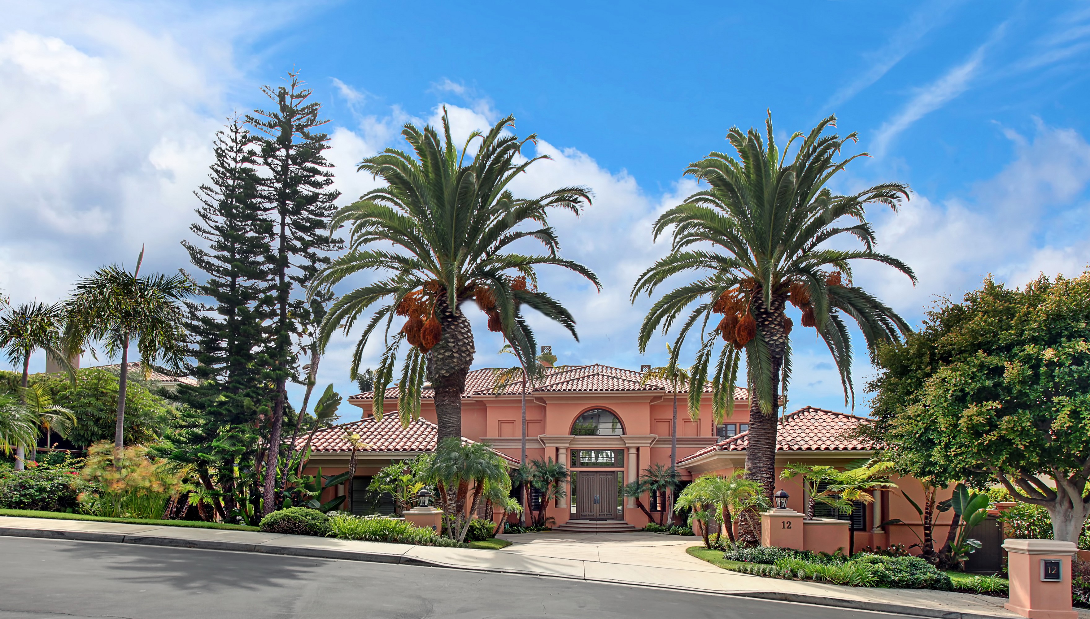 Pink Mediterranean Style House with Palm Trees HD Wallpaper