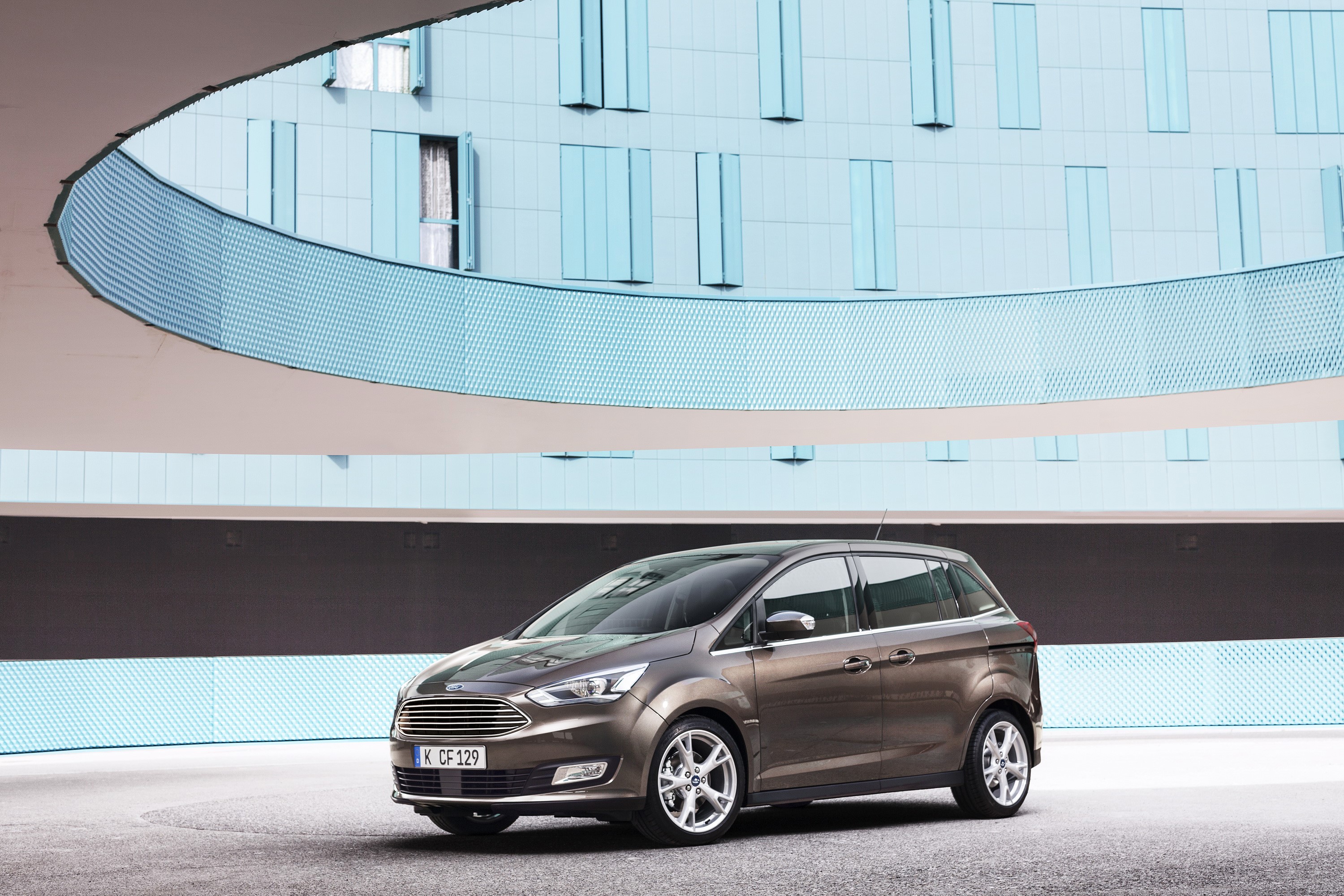 2015 Ford Grand C-Max parked in front of a modern building HD Wallpaper