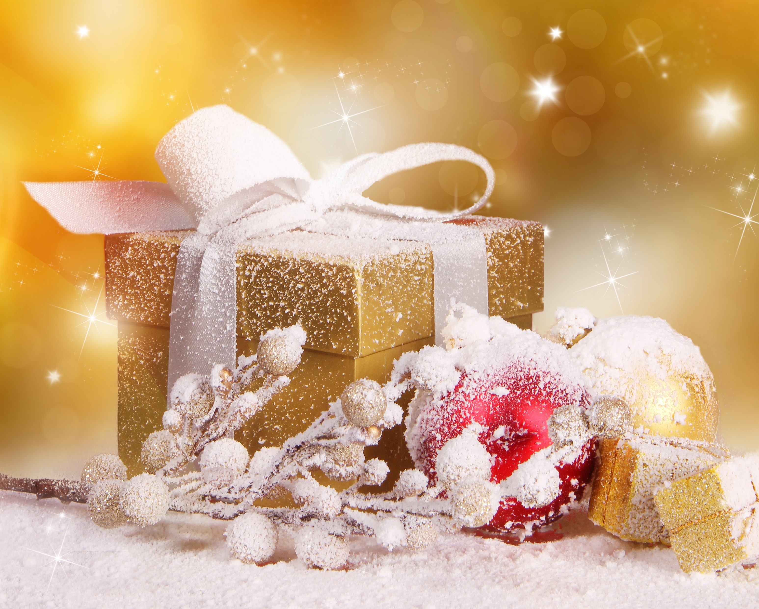 Christmas gifts and ornaments covered in snow HD Wallpaper