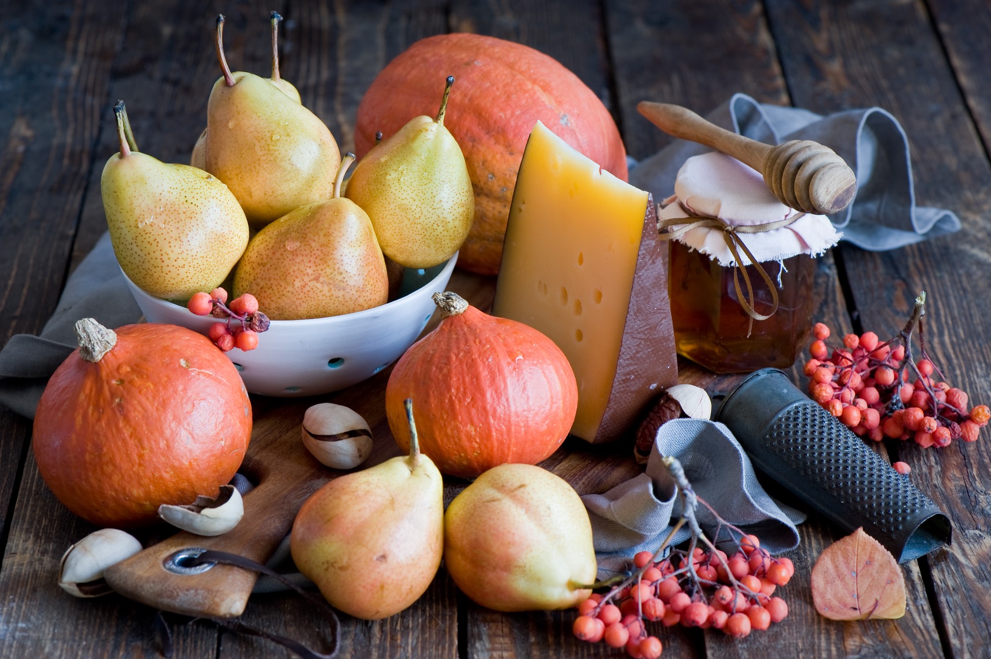 Still-life of pumpkins, pears, cheese, and honey HD Wallpaper