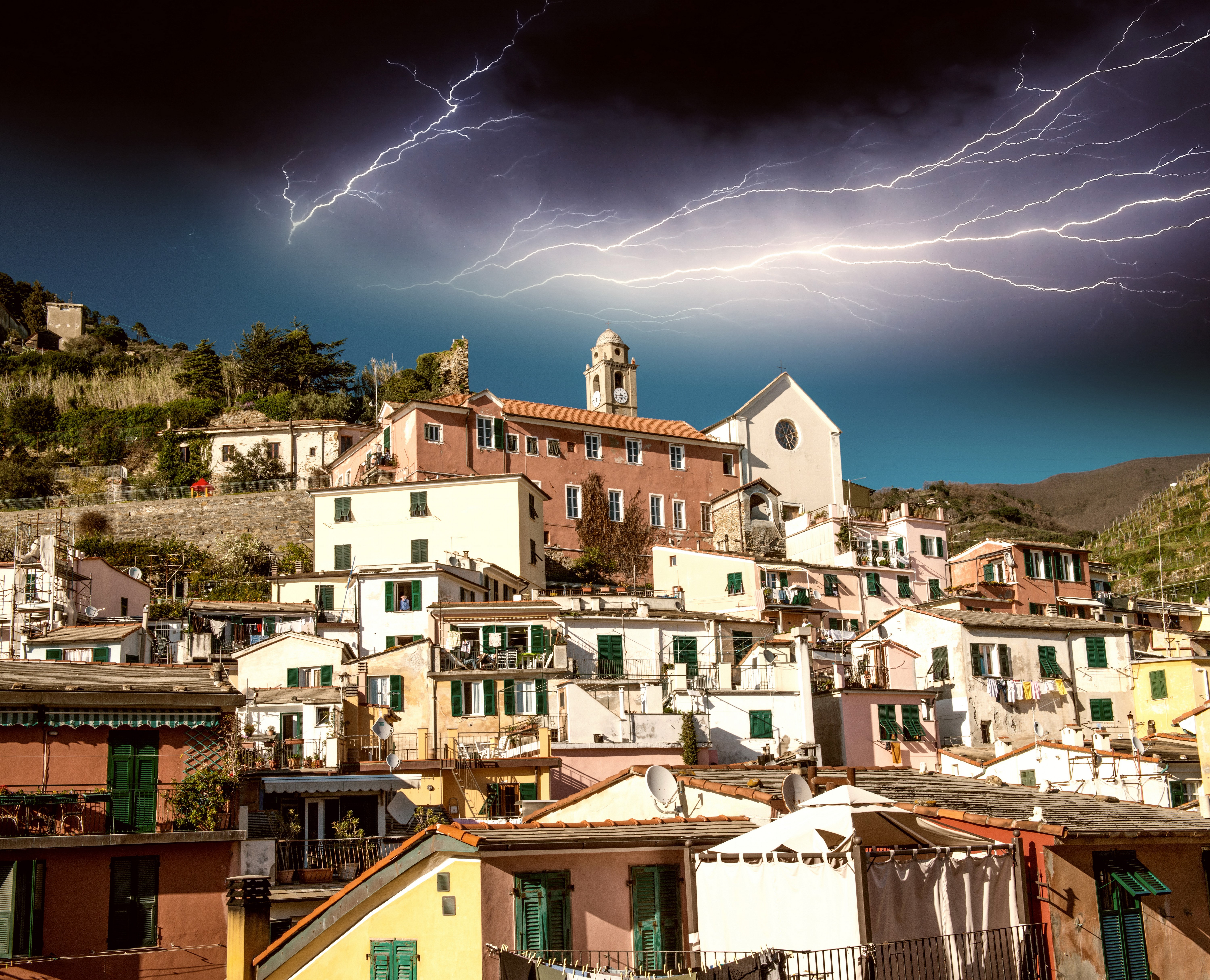 Houses in Vernazza, Cinque Terre park, Italy during a lightning storm HD Wallpaper