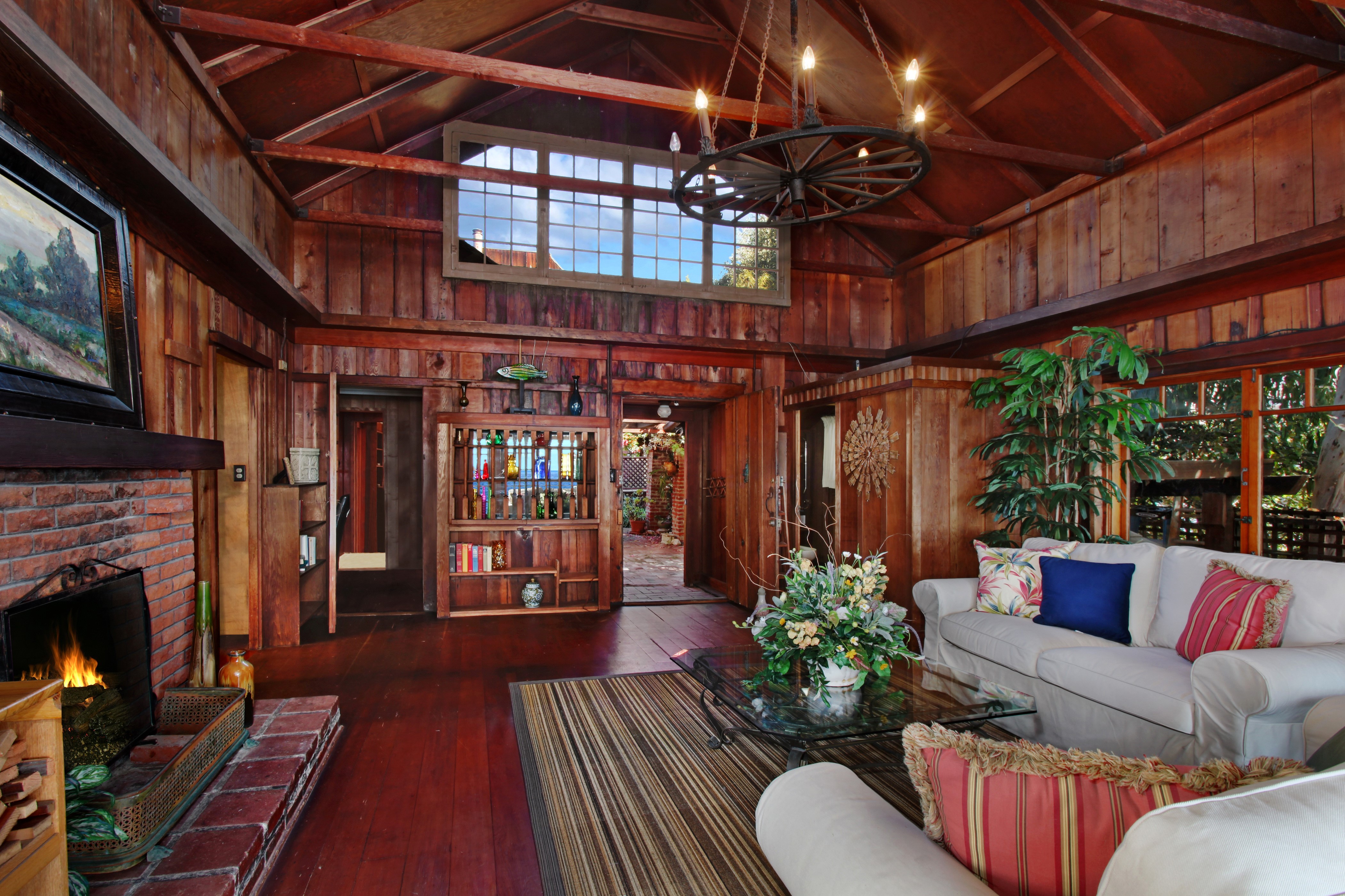 Rustic Living Room with Fireplace and Sofa HD Wallpaper