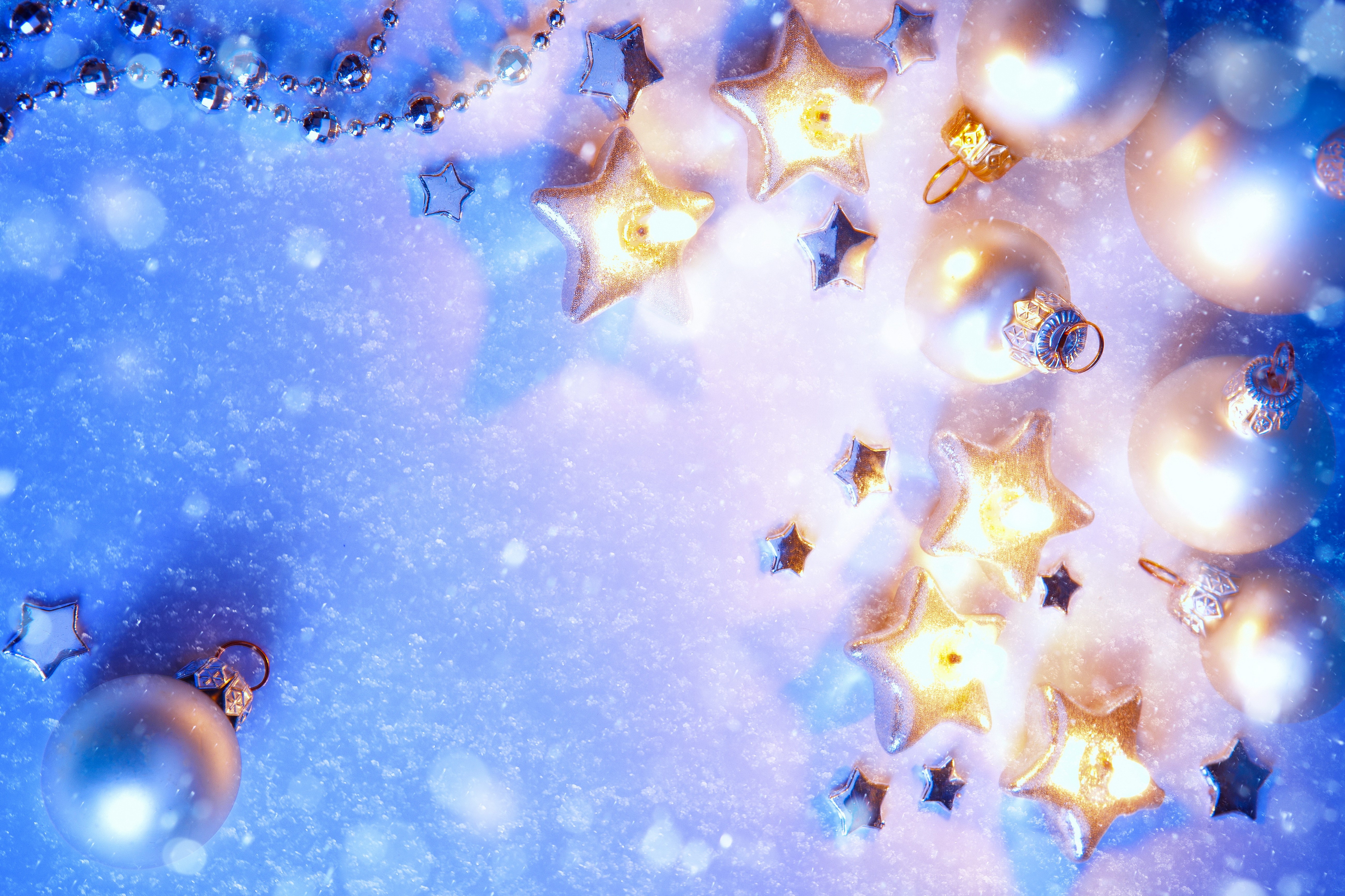 Christmas ornaments and stars on a snowy background HD Wallpaper