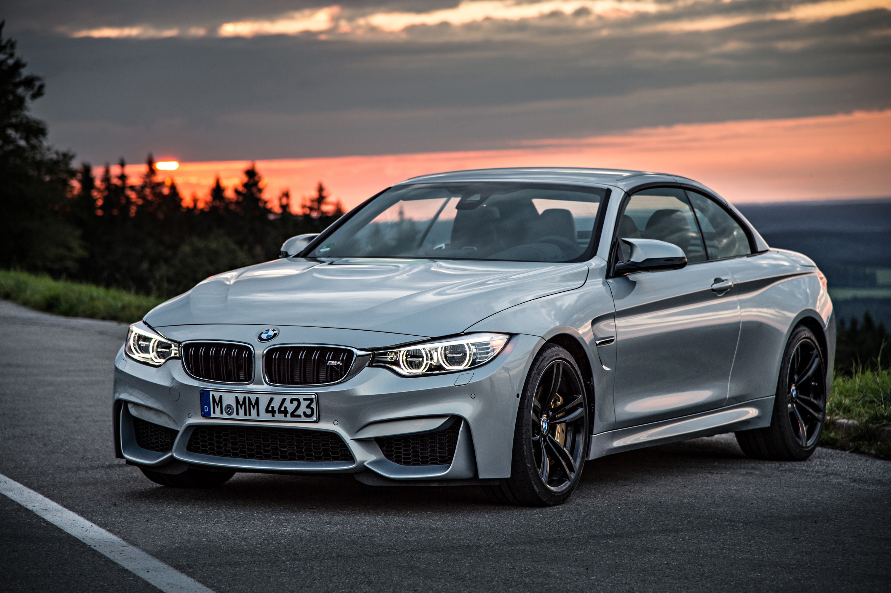 Silver BMW M4 Convertible on a Road at Sunset HD Wallpaper