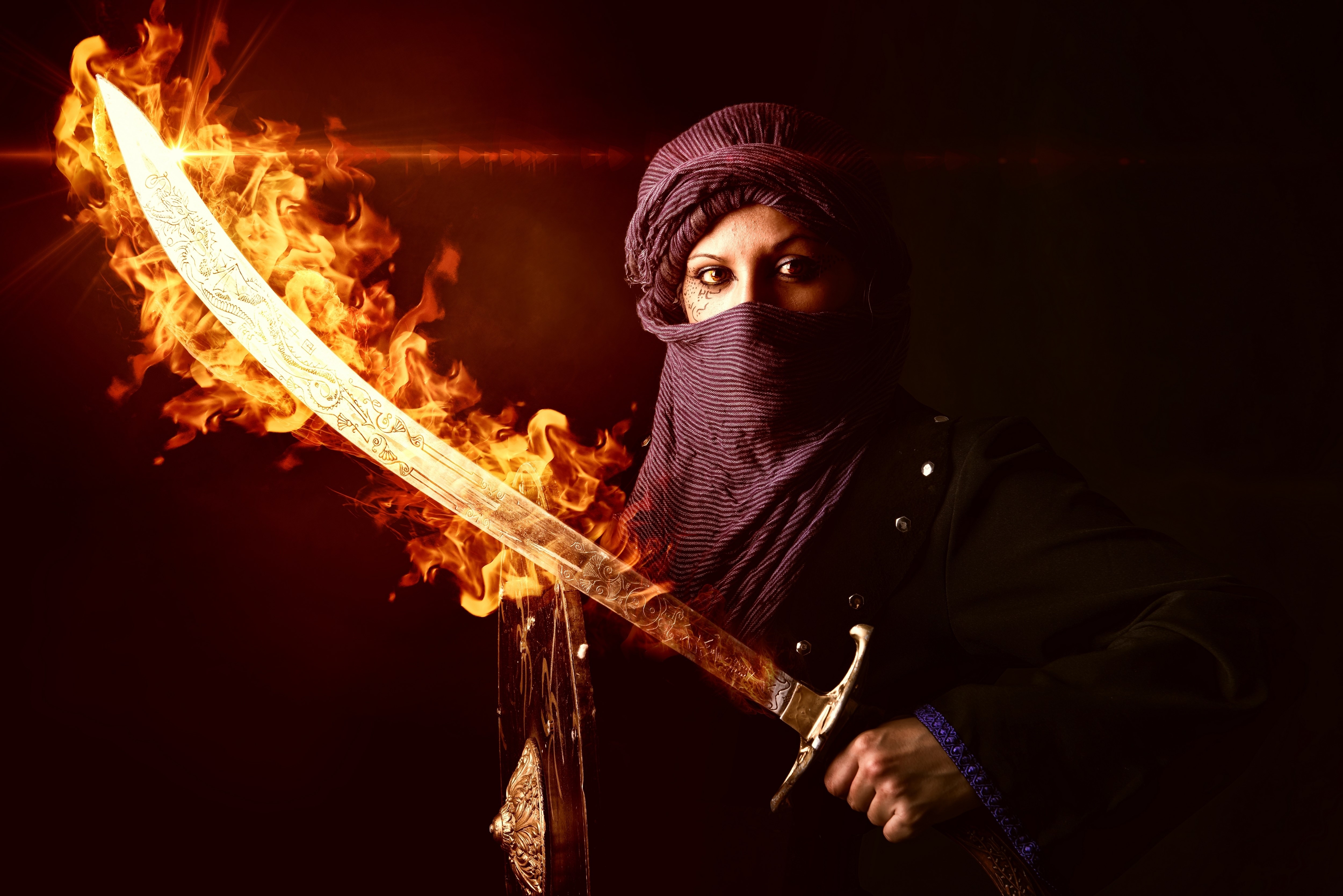 Warrior with flaming sword and turban HD Wallpaper
