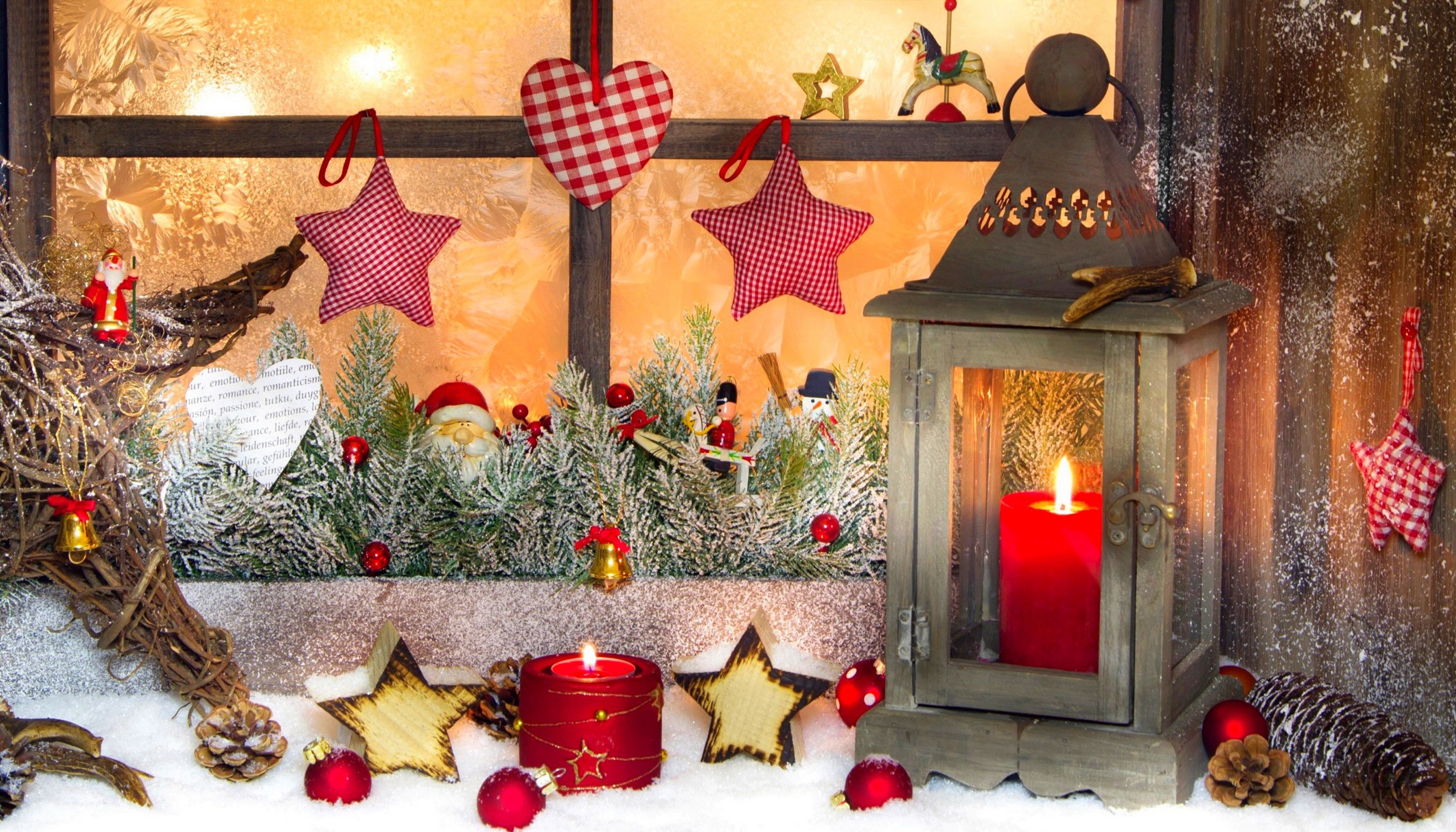 Christmas window decoration with candles and ornaments HD Wallpaper