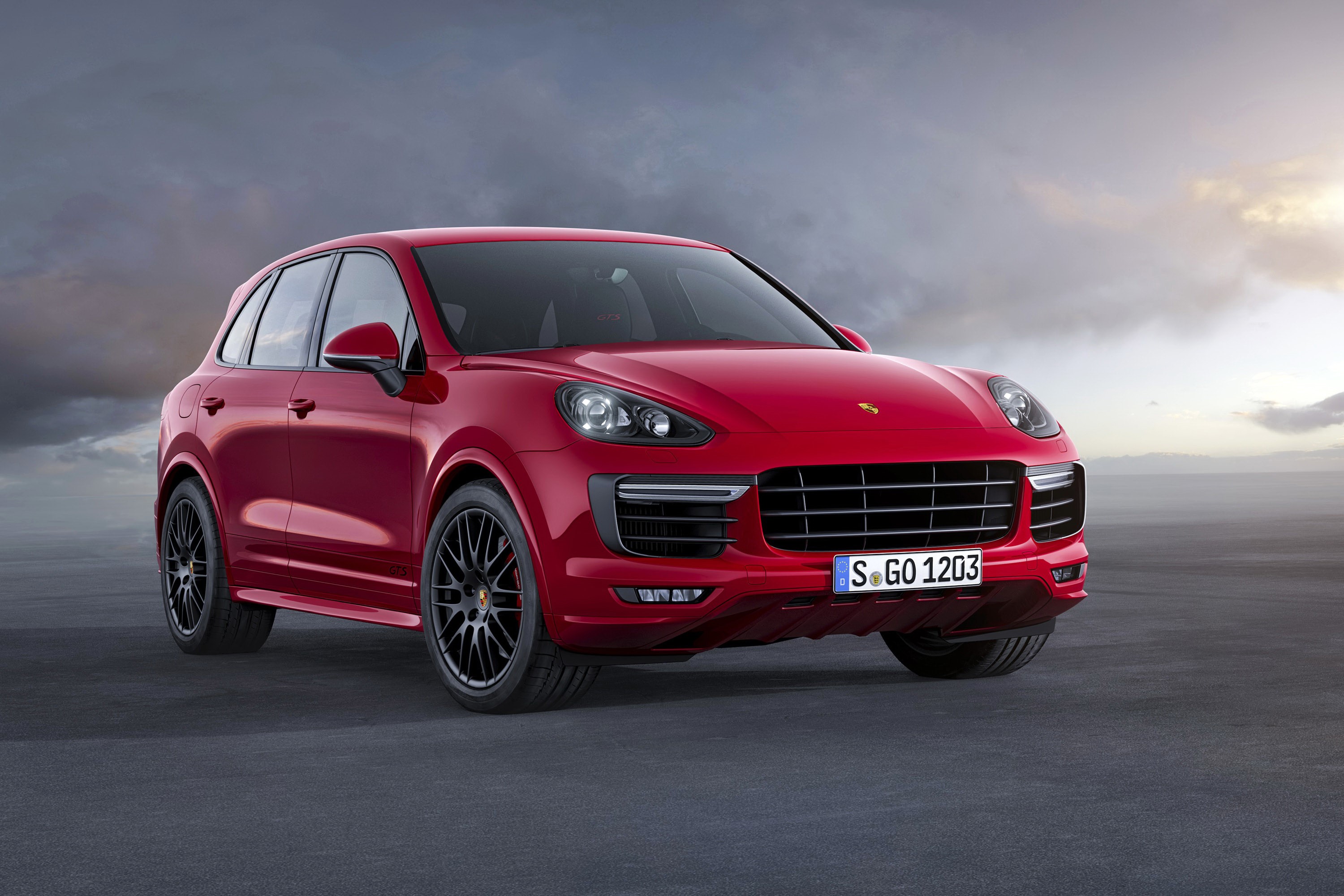 Red Porsche Cayenne GTS parked on asphalt HD Wallpaper
