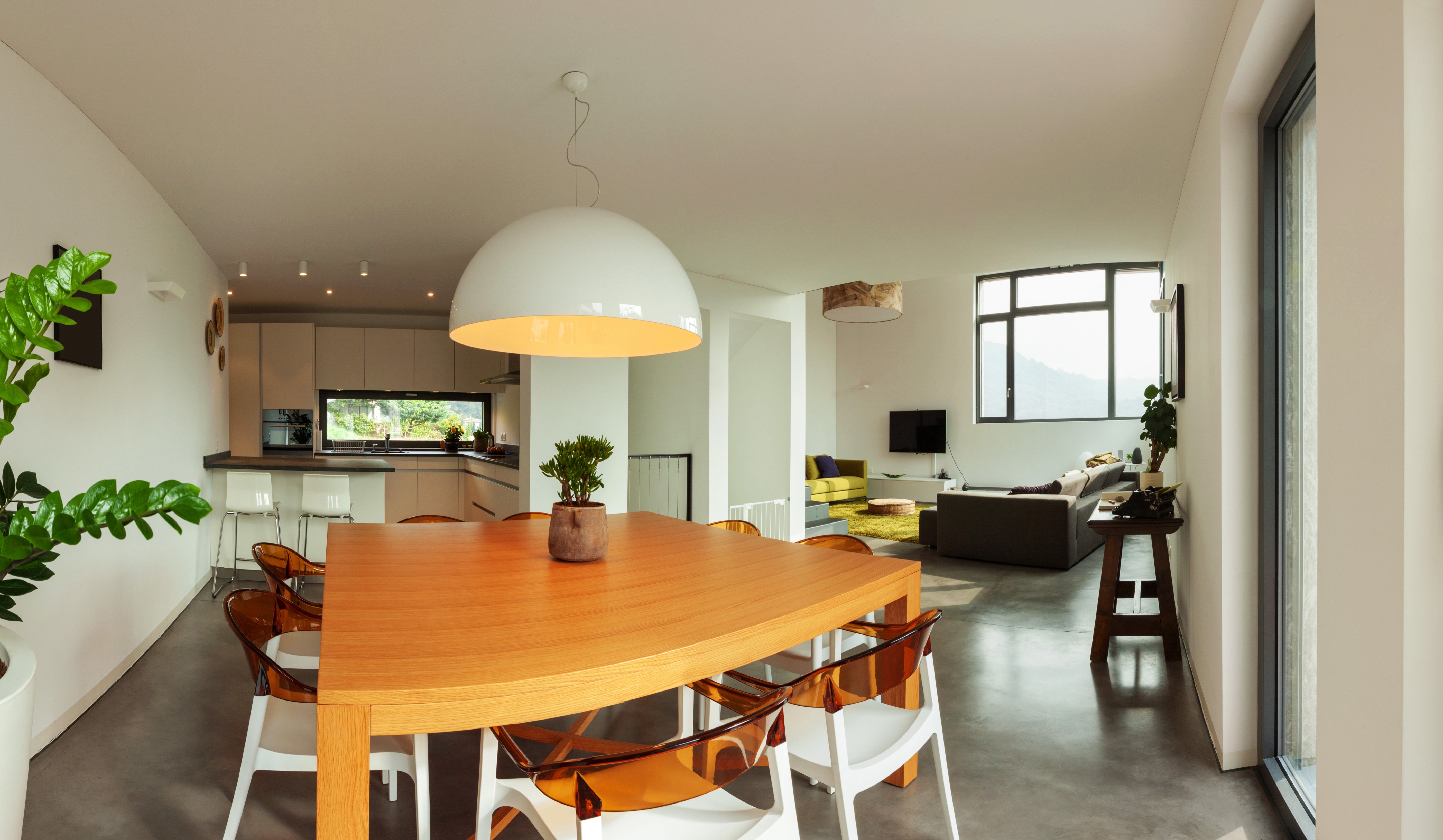 Modern dining room and living room interior with large windows HD Wallpaper