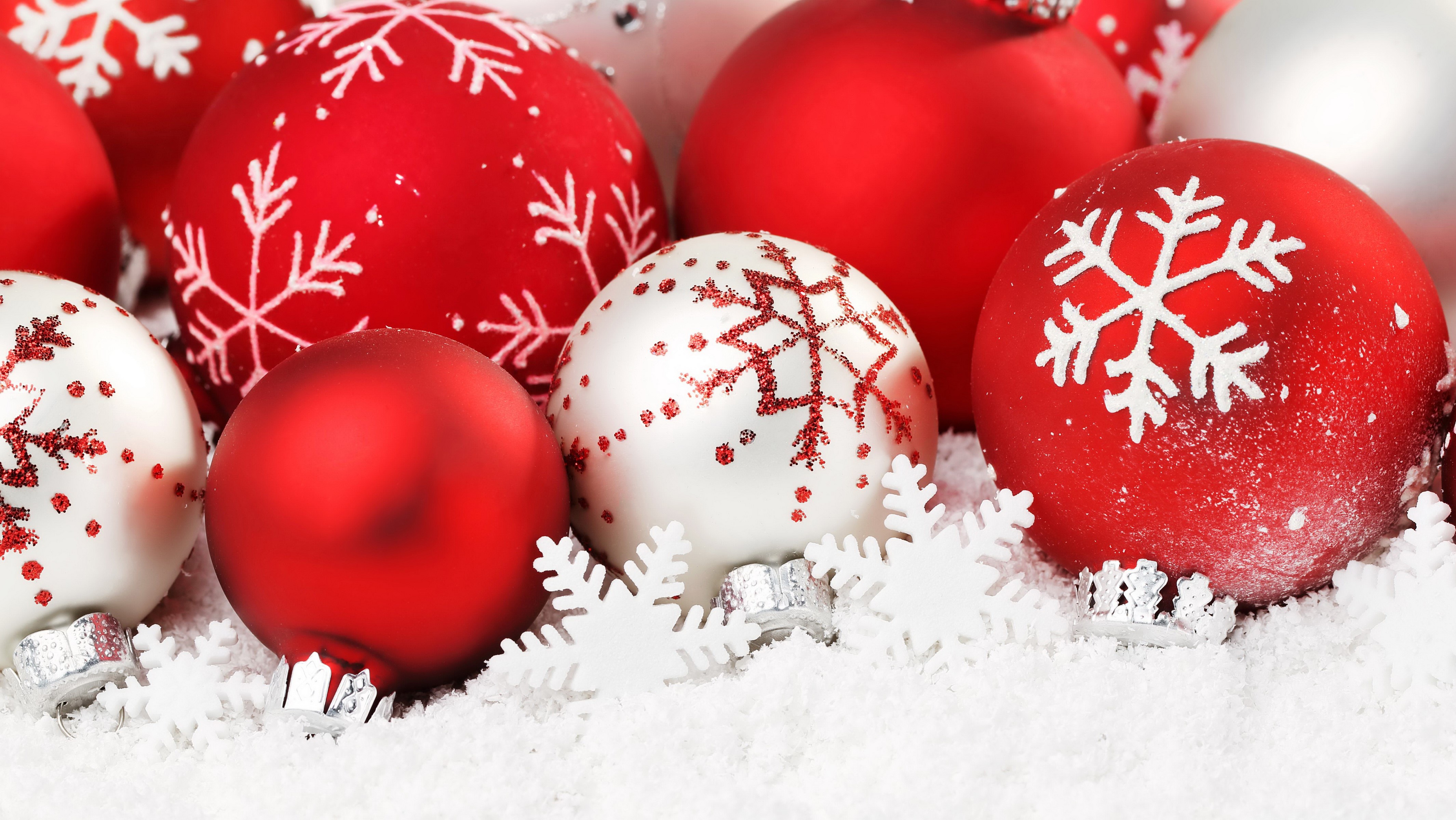 Christmas ornaments with snowflakes in snow HD Wallpaper