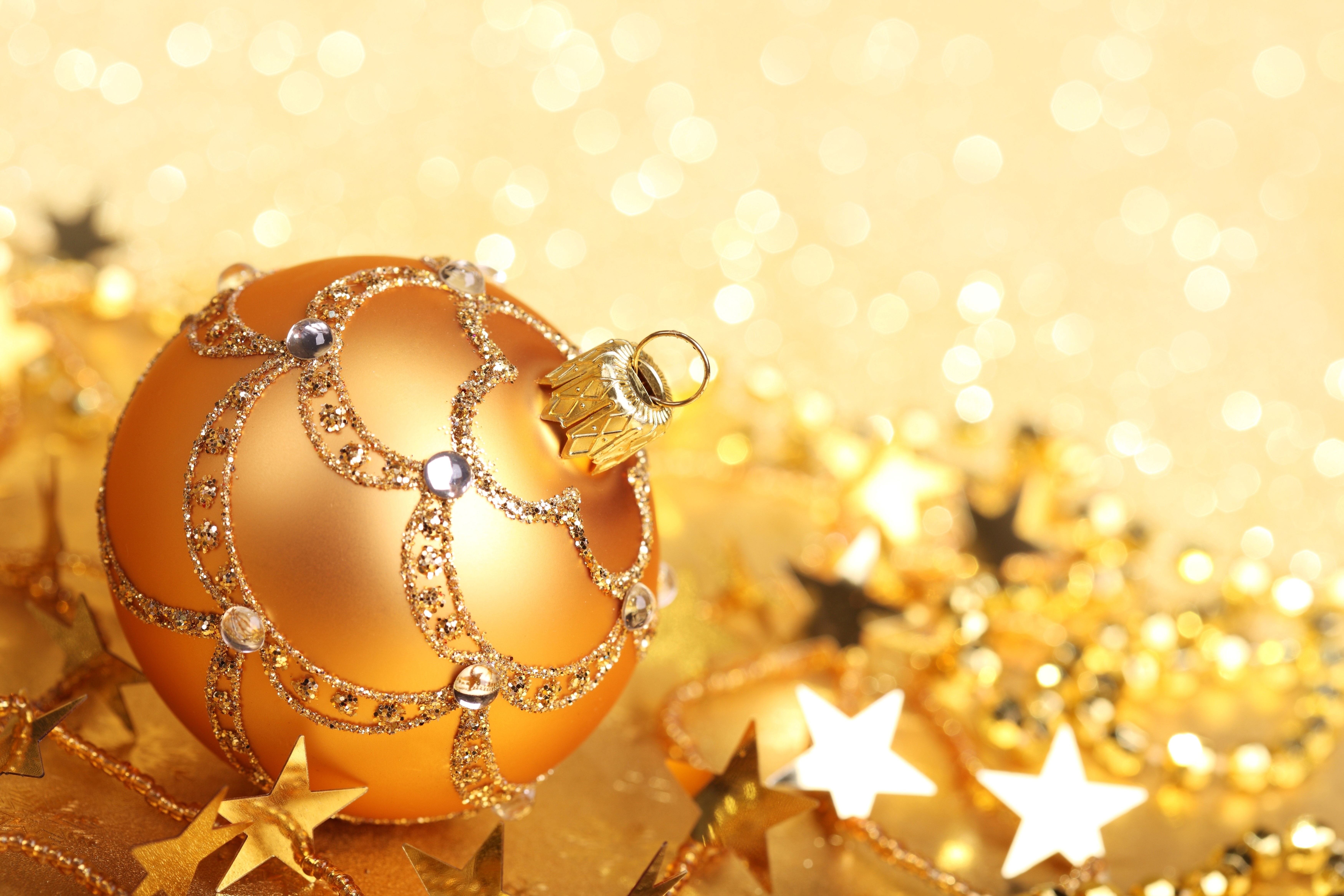 Gold Christmas Ornament with Stars and Bokeh HD Wallpaper