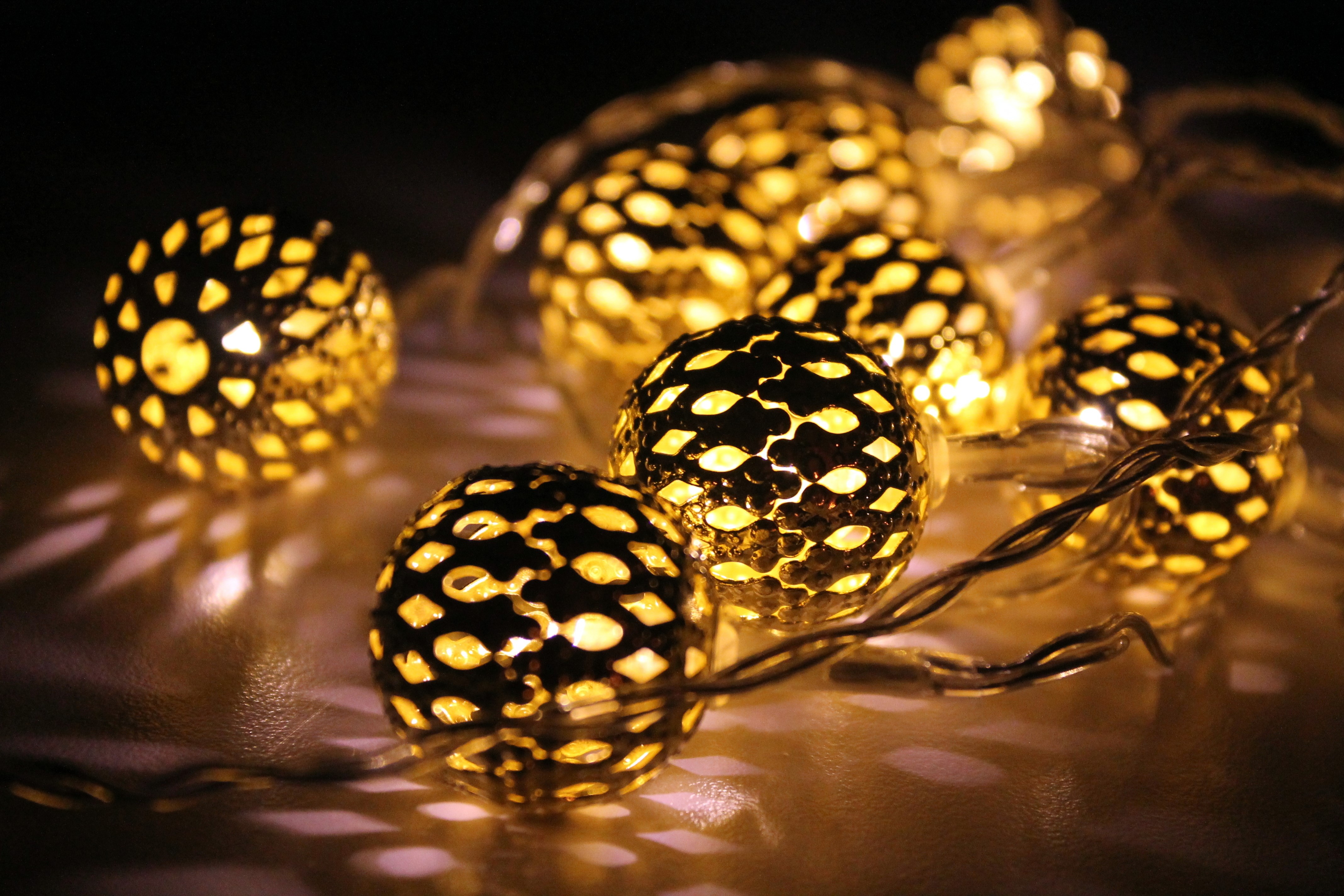Holidays string lights with decorative balls HD Wallpaper