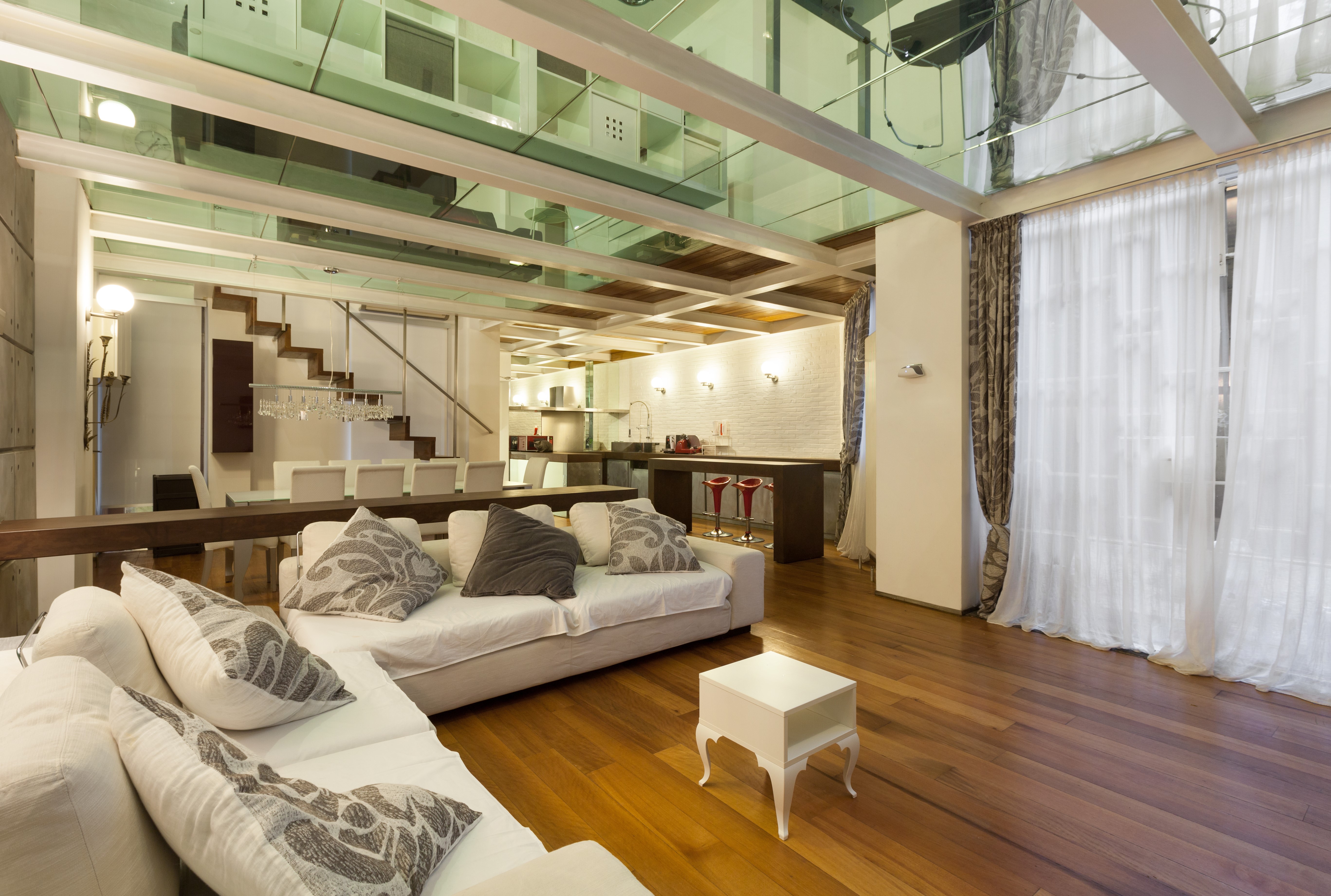 Modern loft living room with sofa and dining area HD Wallpaper