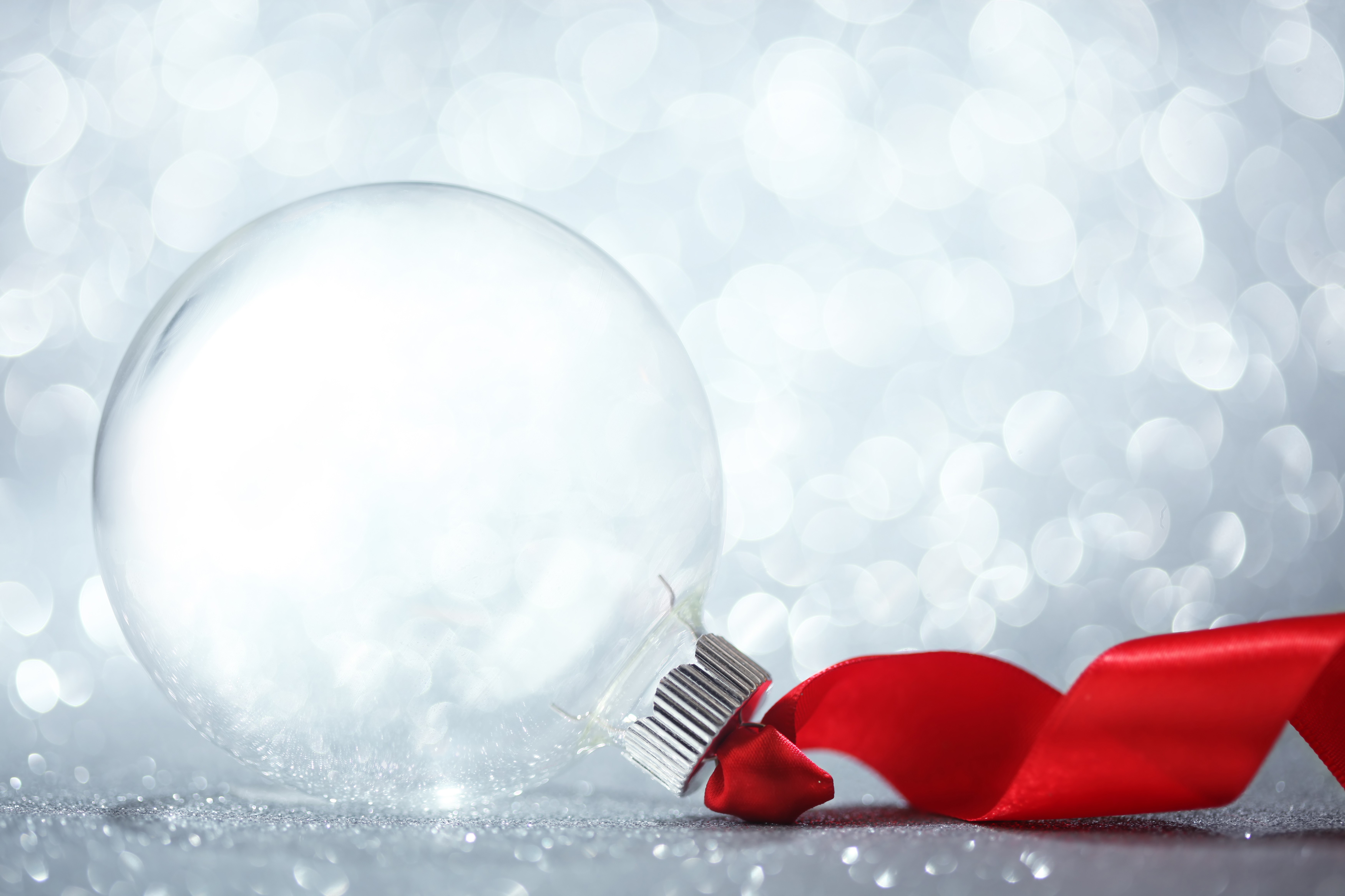 Clear Christmas Ornament with Red Ribbon HD Wallpaper
