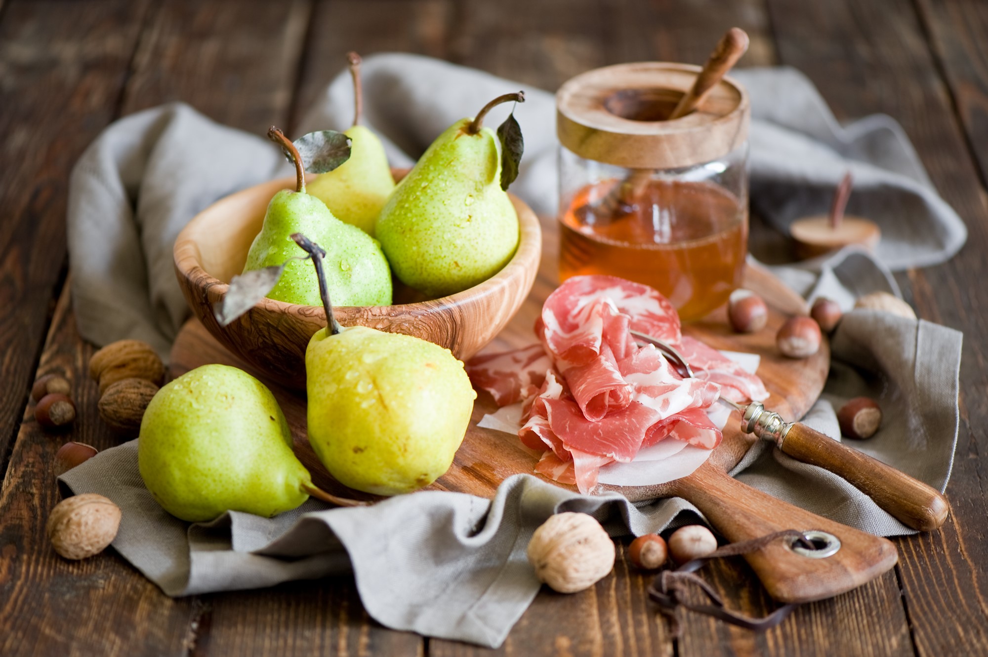 Still life with pears, ham, nuts, and honey HD Wallpaper