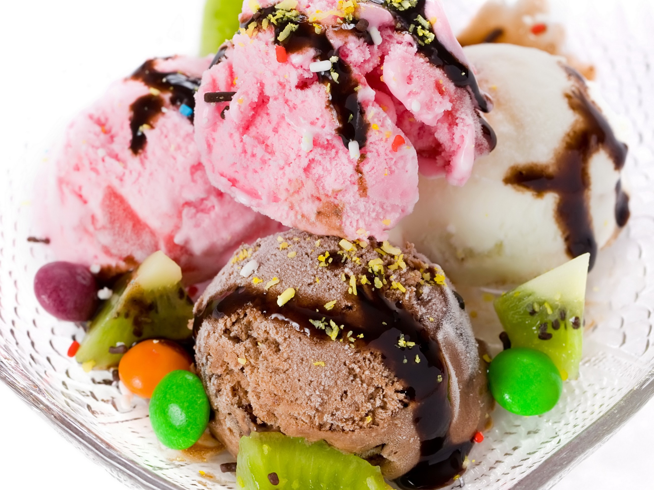 Assorted ice cream scoops with toppings and fruit HD Wallpaper